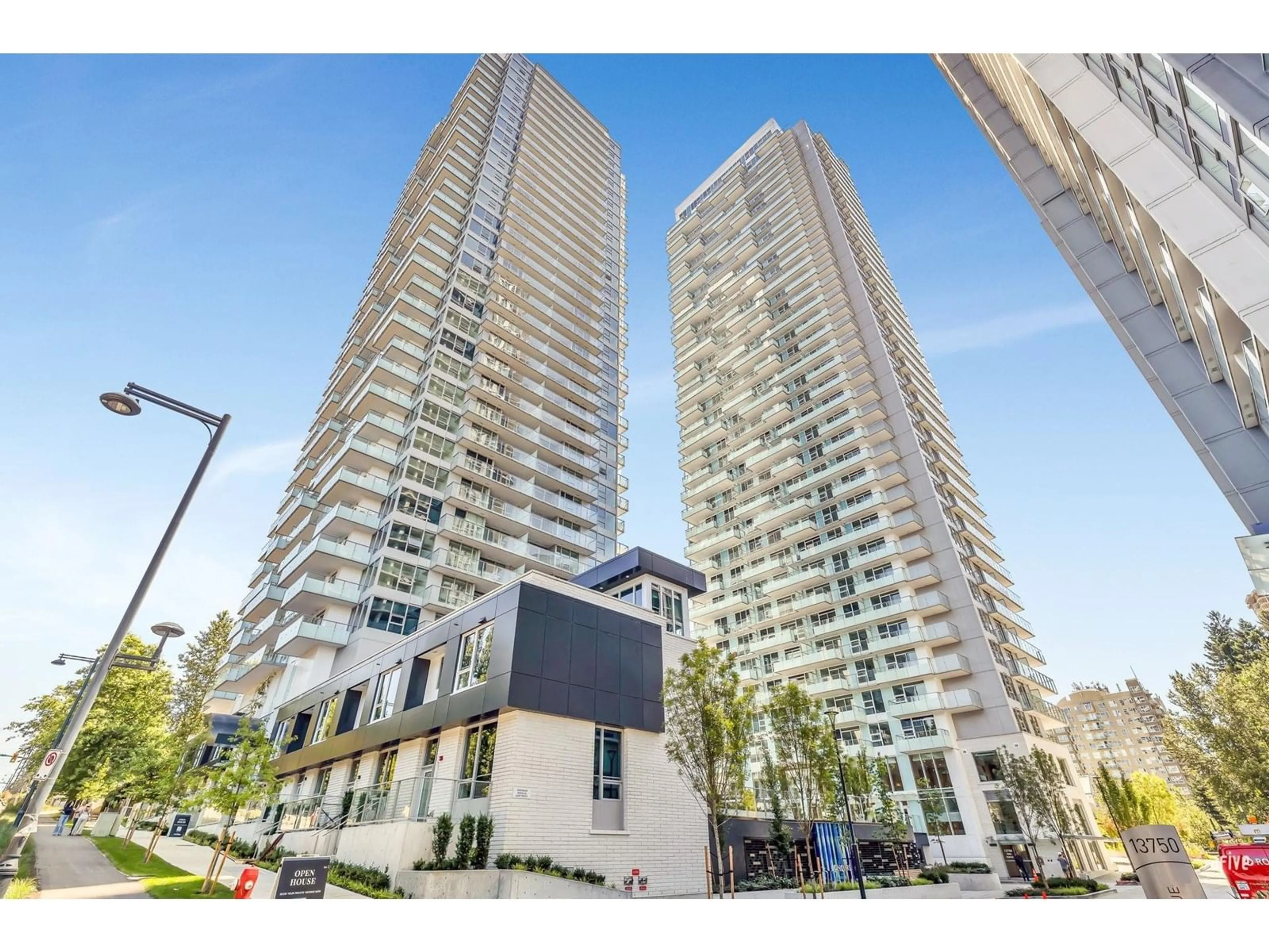 A pic from outside/outdoor area/front of a property/back of a property/a pic from drone, unknown for 1310 - 13778 100, Surrey British Columbia V4N5R4