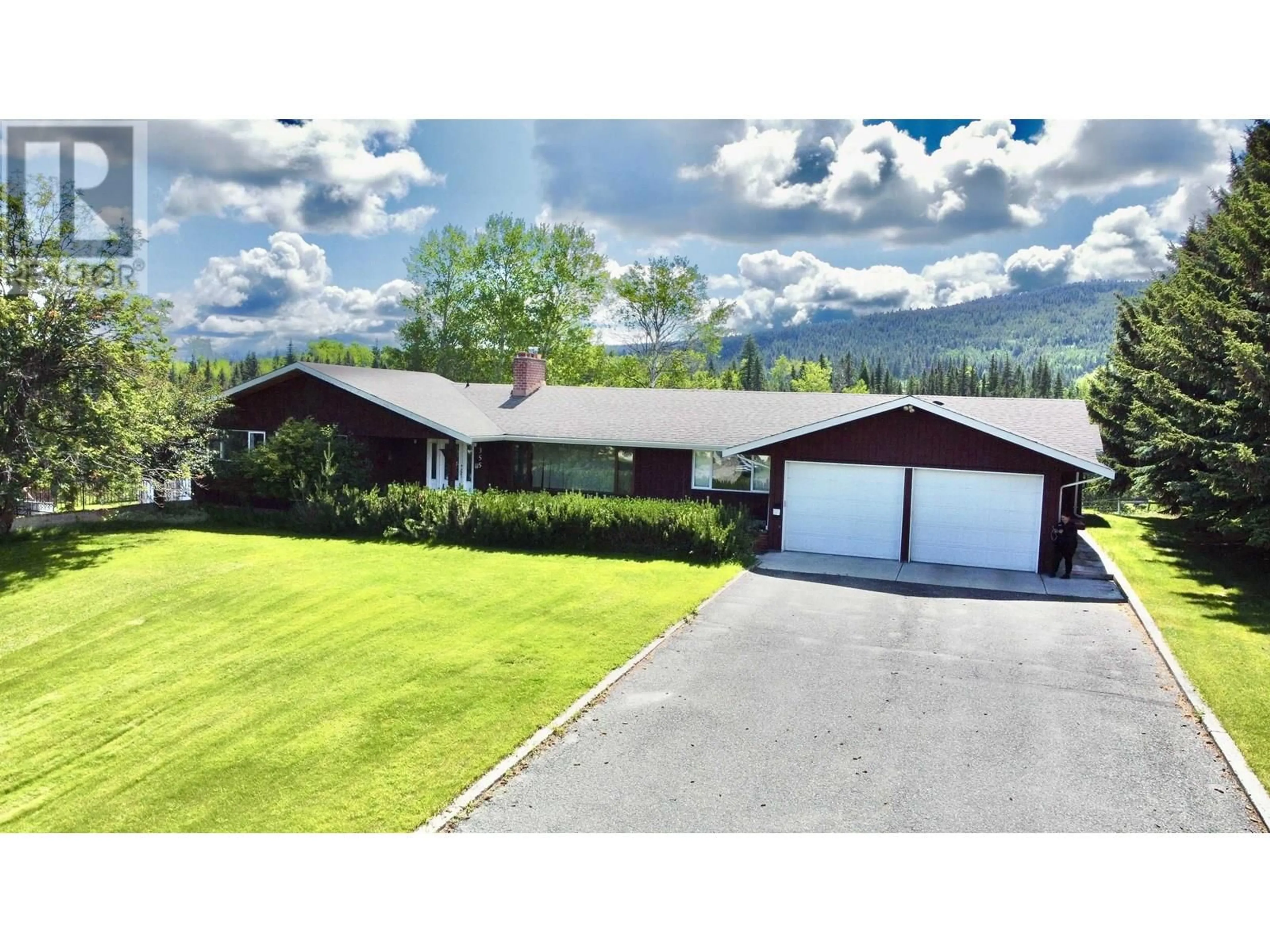 A pic from outside/outdoor area/front of a property/back of a property/a pic from drone, mountain view for 355 EVERGREEN CRESCENT, 100 Mile House British Columbia V0K2E0