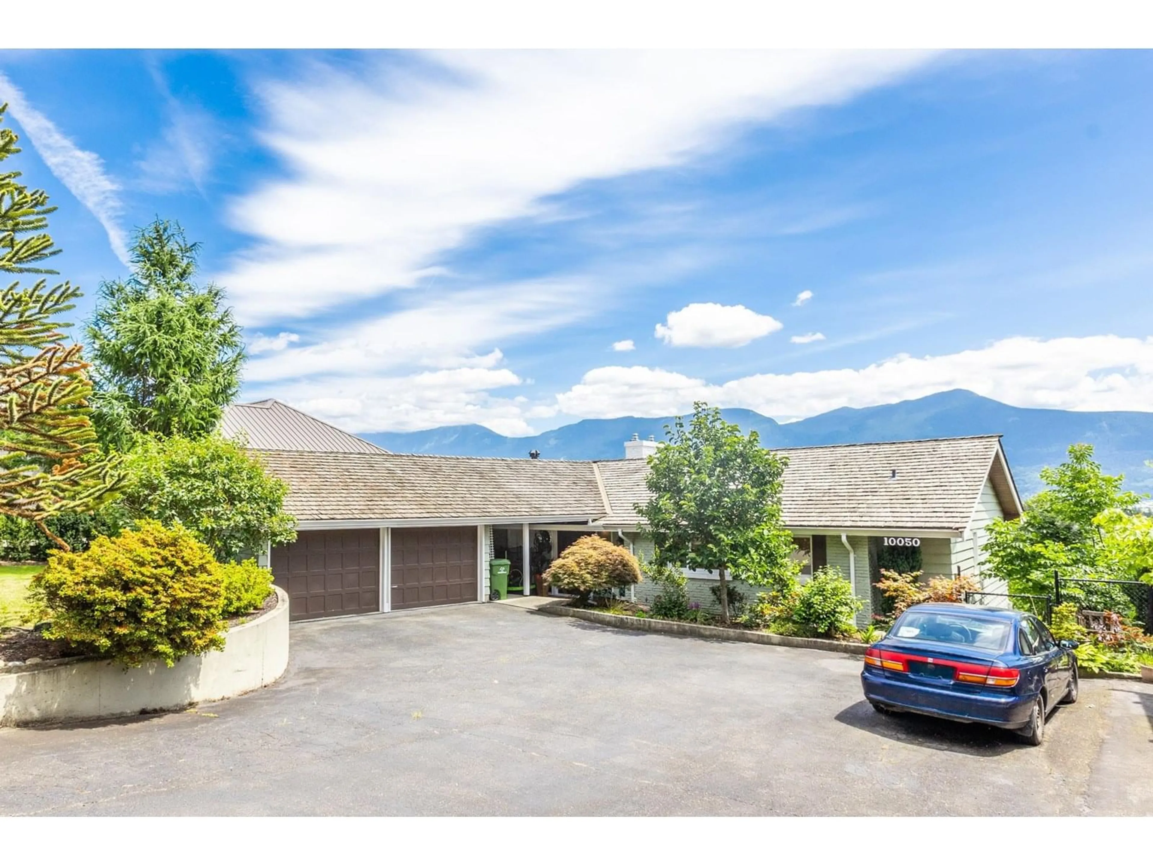 A pic from outside/outdoor area/front of a property/back of a property/a pic from drone, mountain view for 10050 TIMBERLINE PLACE, Chilliwack British Columbia V2P7N9