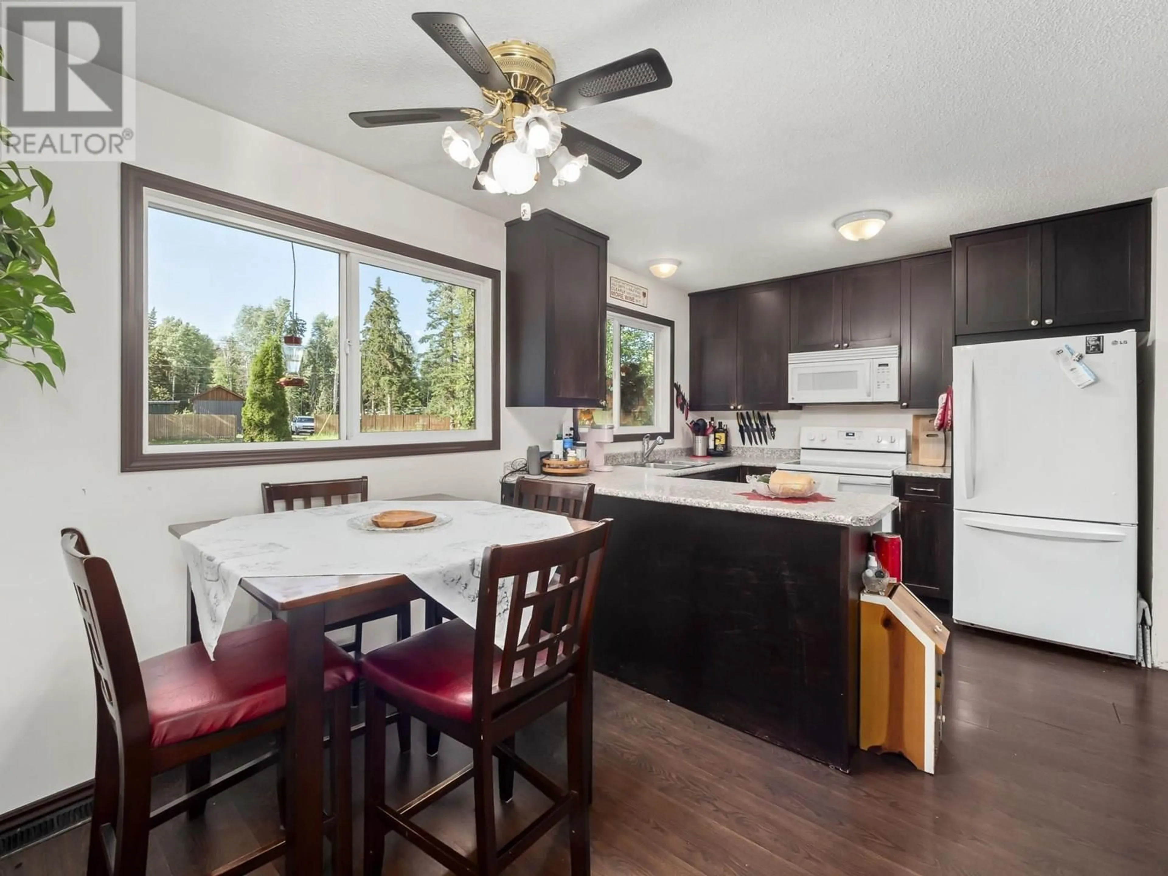 Open concept kitchen, wood/laminate floor for 16255 ALLEN ROAD, Prince George British Columbia V2K5K8