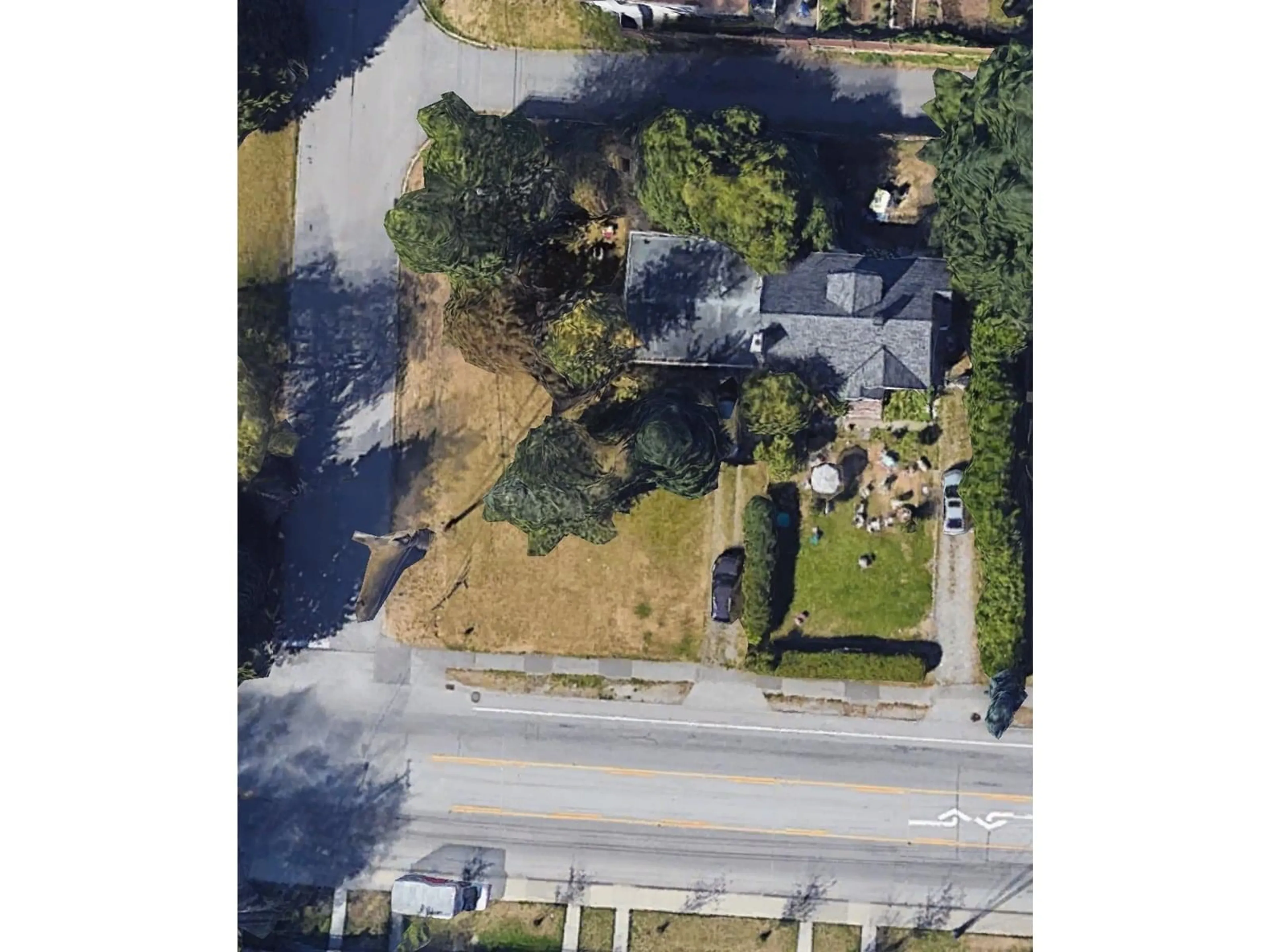 A pic from outside/outdoor area/front of a property/back of a property/a pic from drone, street for 9915 132, Surrey British Columbia V3T3S9