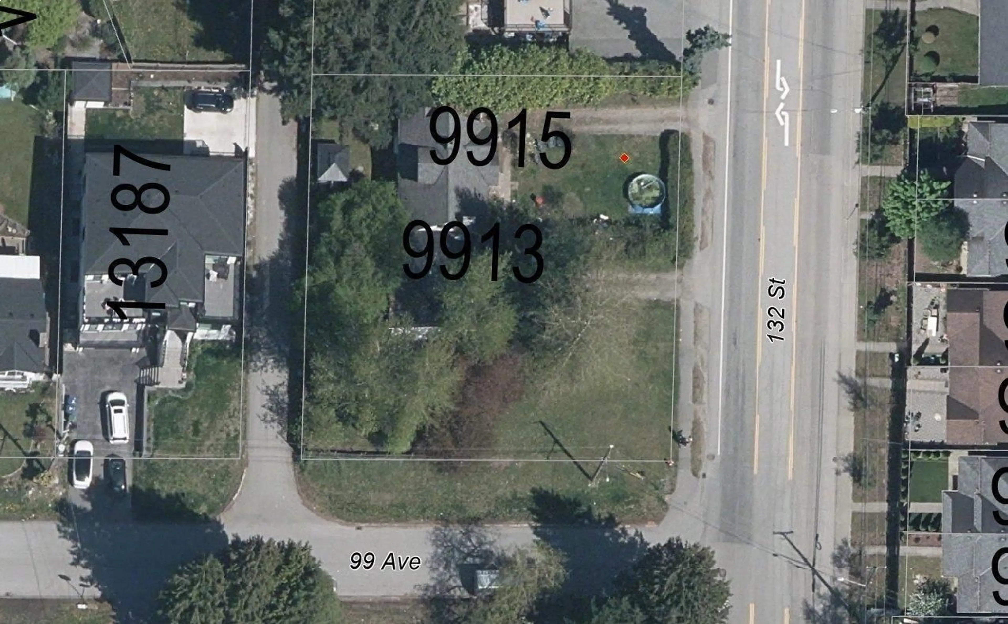 A pic from outside/outdoor area/front of a property/back of a property/a pic from drone, street for 9915 132, Surrey British Columbia V3T3S9