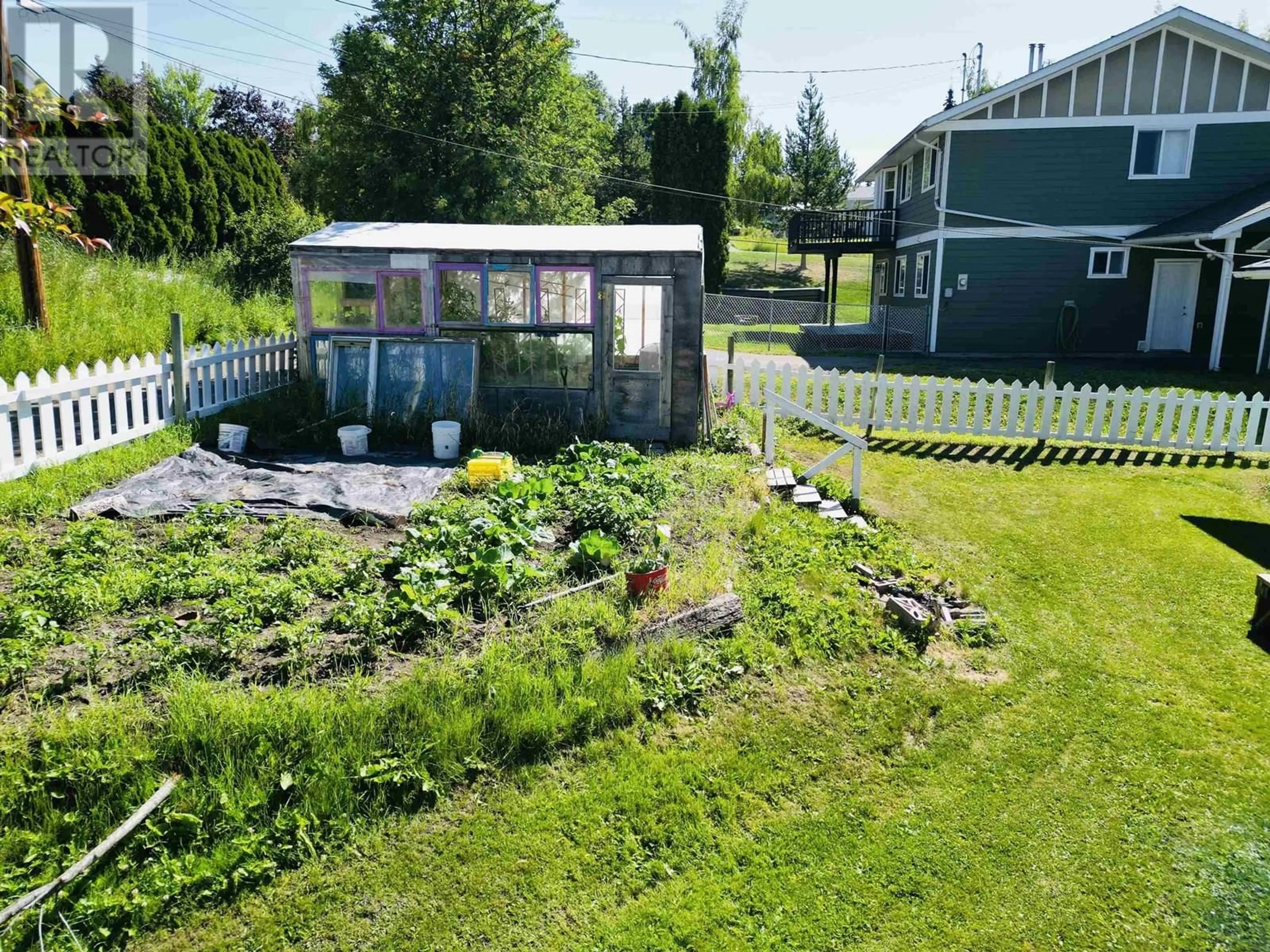 A pic from outside/outdoor area/front of a property/back of a property/a pic from drone, water/lake/river/ocean view for 51 8TH AVENUE, Burns Lake British Columbia V0J1E0