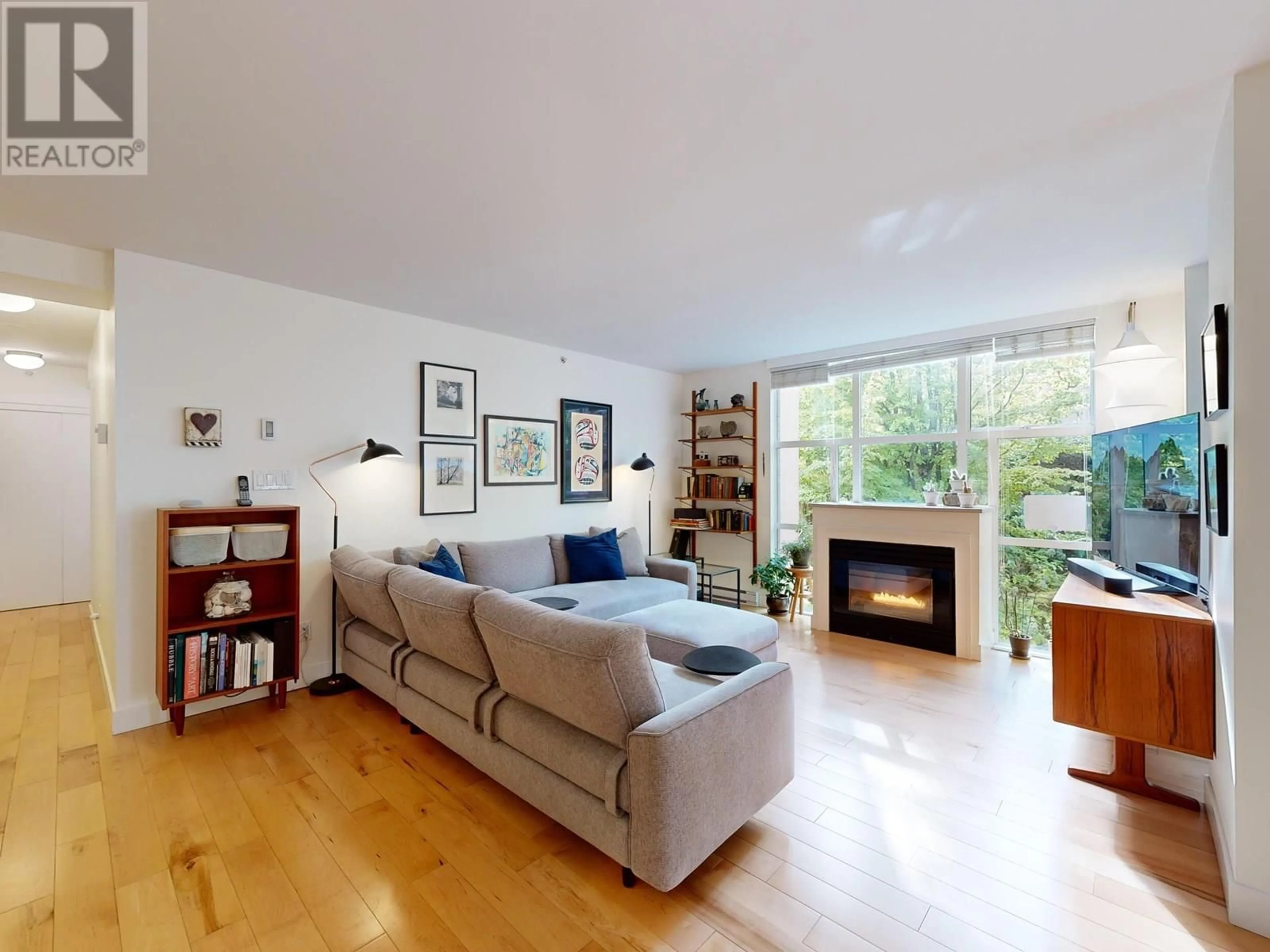Living room with furniture, wood/laminate floor for 203 - 518 14TH AVENUE, Vancouver British Columbia V5Z4N5