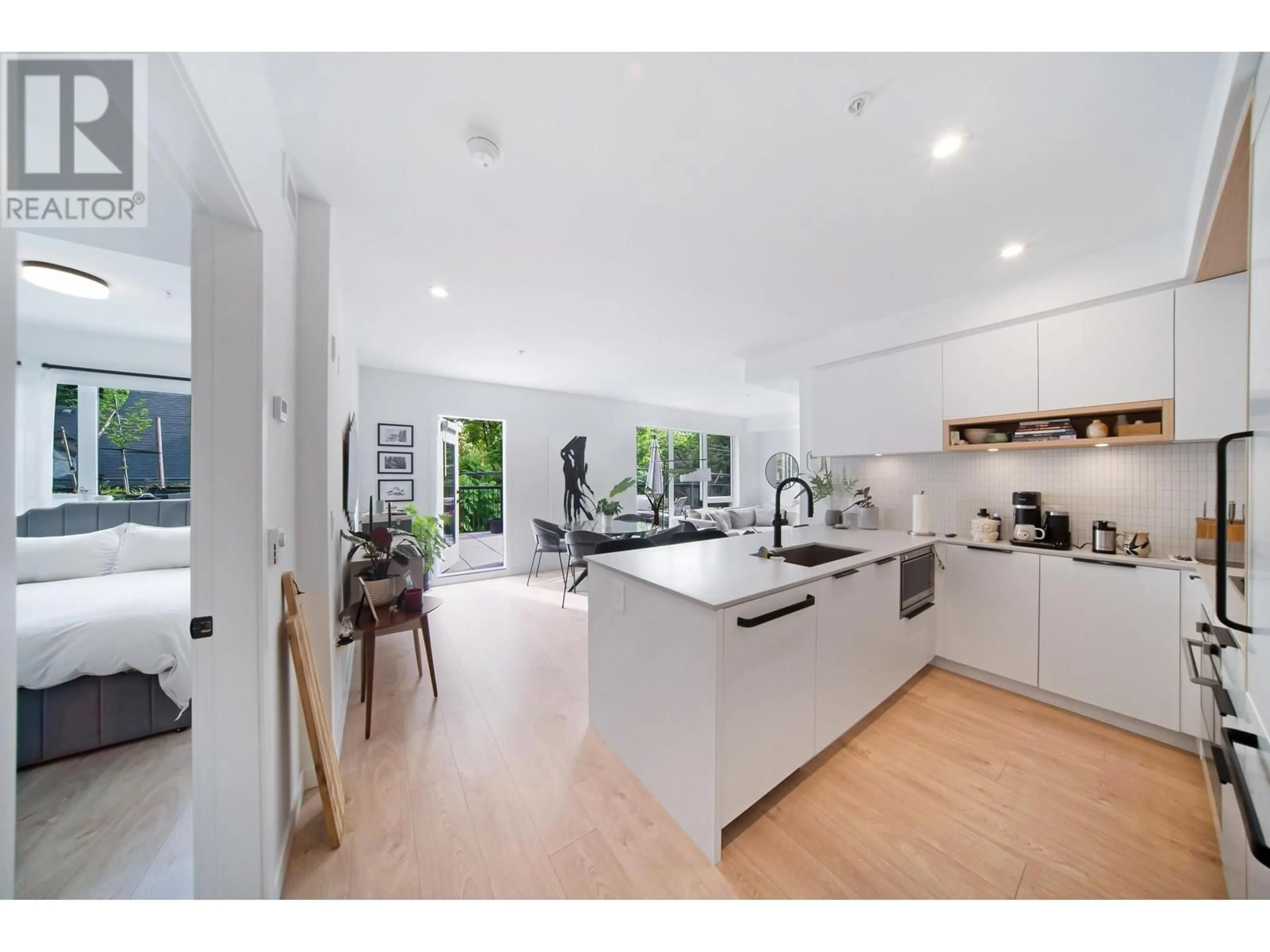 Open concept kitchen, unknown for 221 - 2520 GUELPH STREET, Vancouver British Columbia V5T0K7