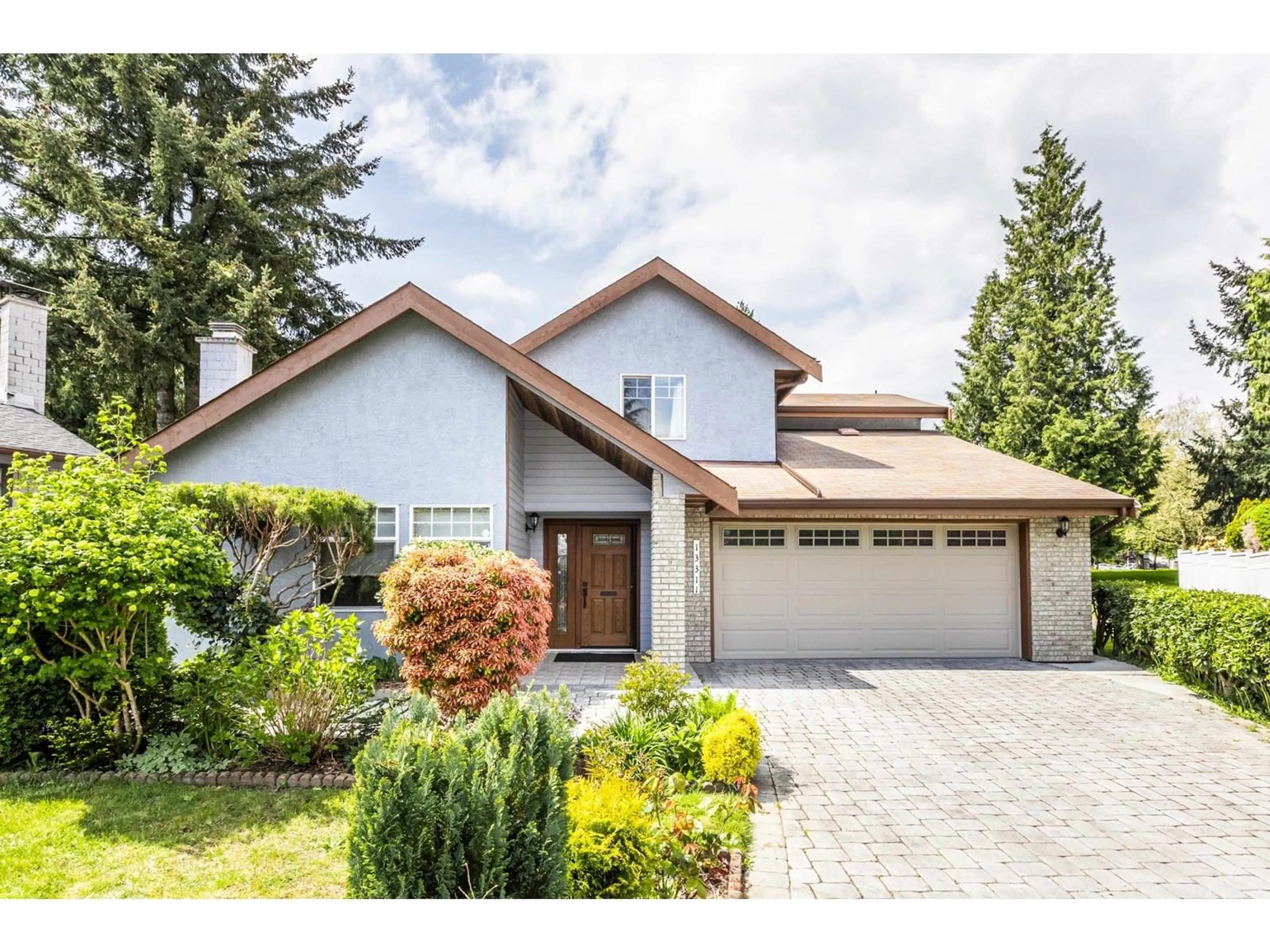 Home with vinyl exterior material, street for 13311 65A, Surrey British Columbia V3W8T1