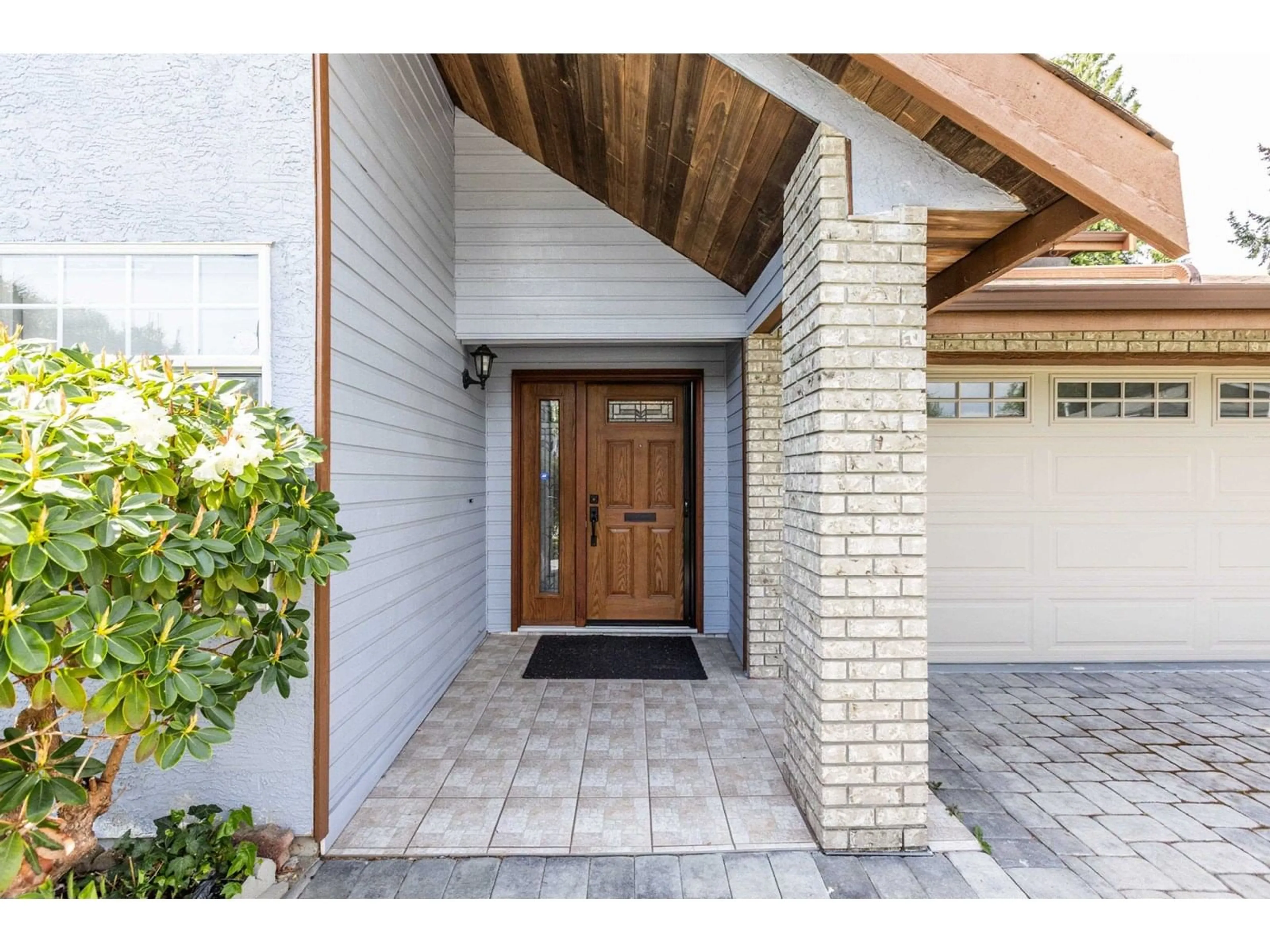Home with brick exterior material, street for 13311 65A, Surrey British Columbia V3W8T1