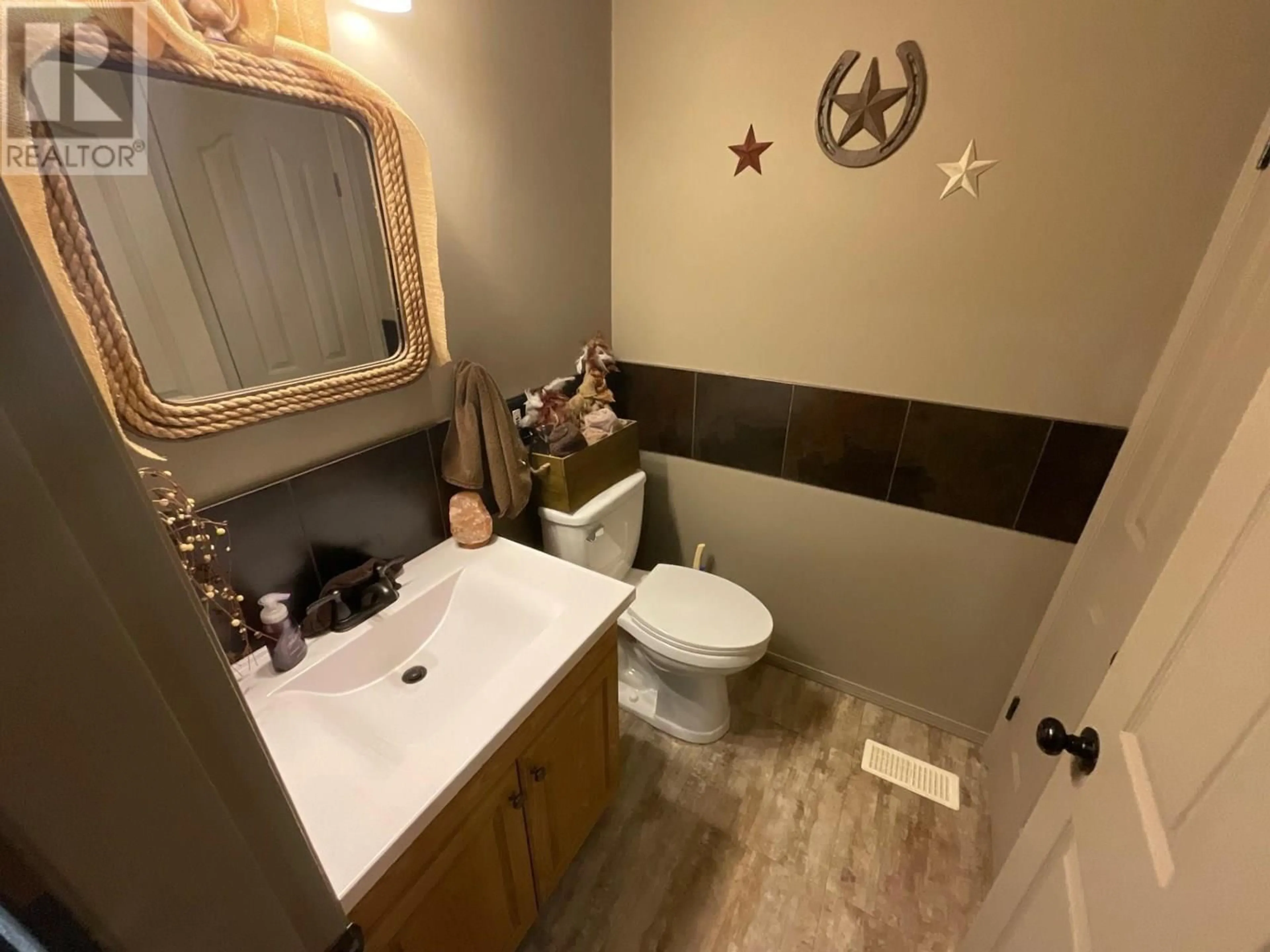 Standard bathroom, ceramic/tile floor for 10264 HIGHWAY 97, Charlie Lake British Columbia V0C1H0