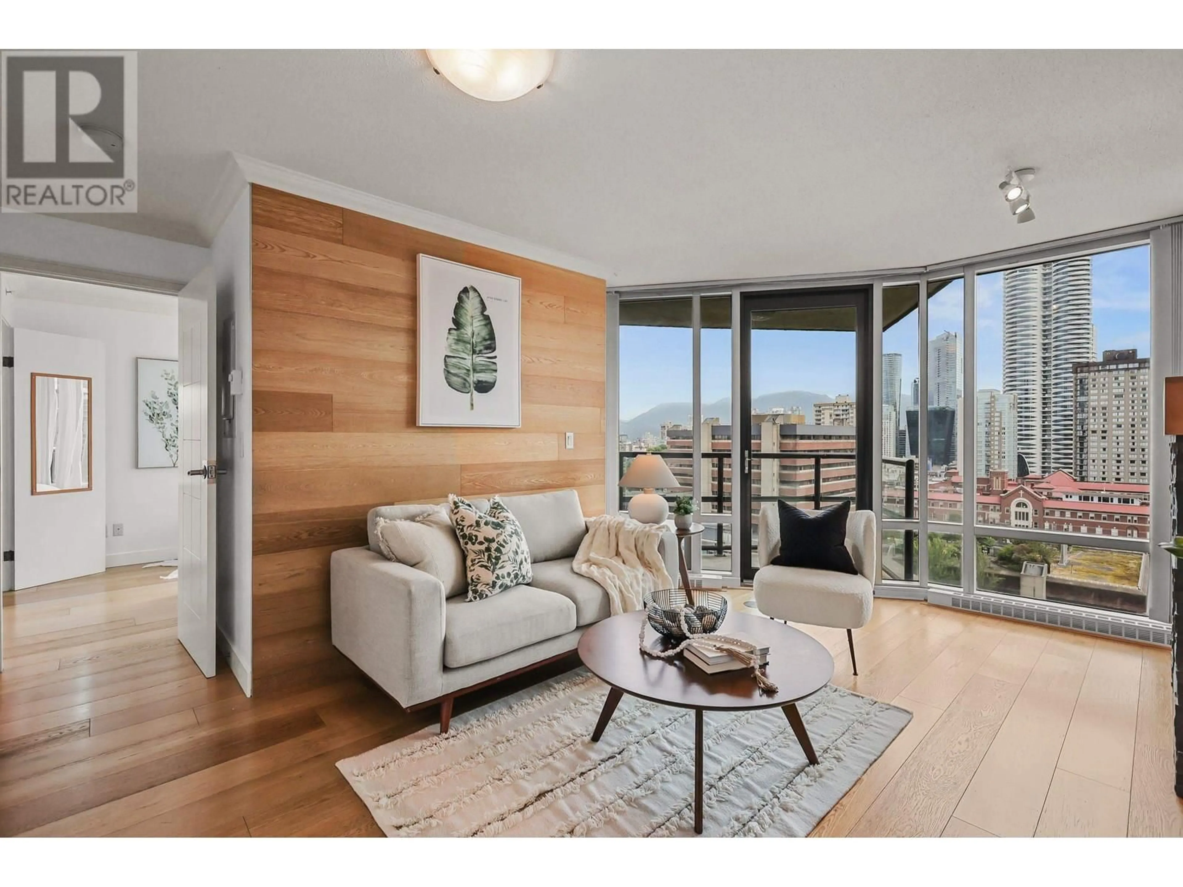 Living room with furniture, wood/laminate floor for 1701 - 1003 BURNABY STREET, Vancouver British Columbia V6E4R7