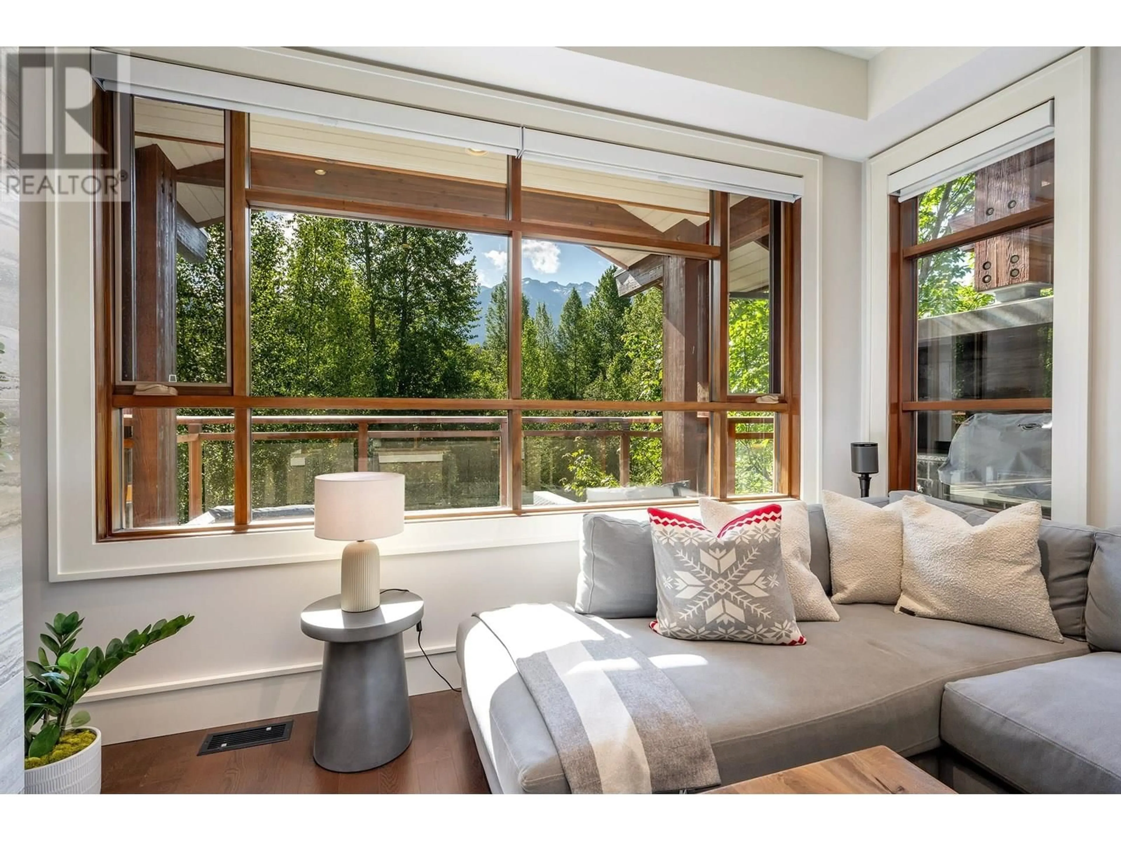 Living room with furniture, wood/laminate floor for 29 - 7124 NANCY GREENE DRIVE, Whistler British Columbia V8E0W9