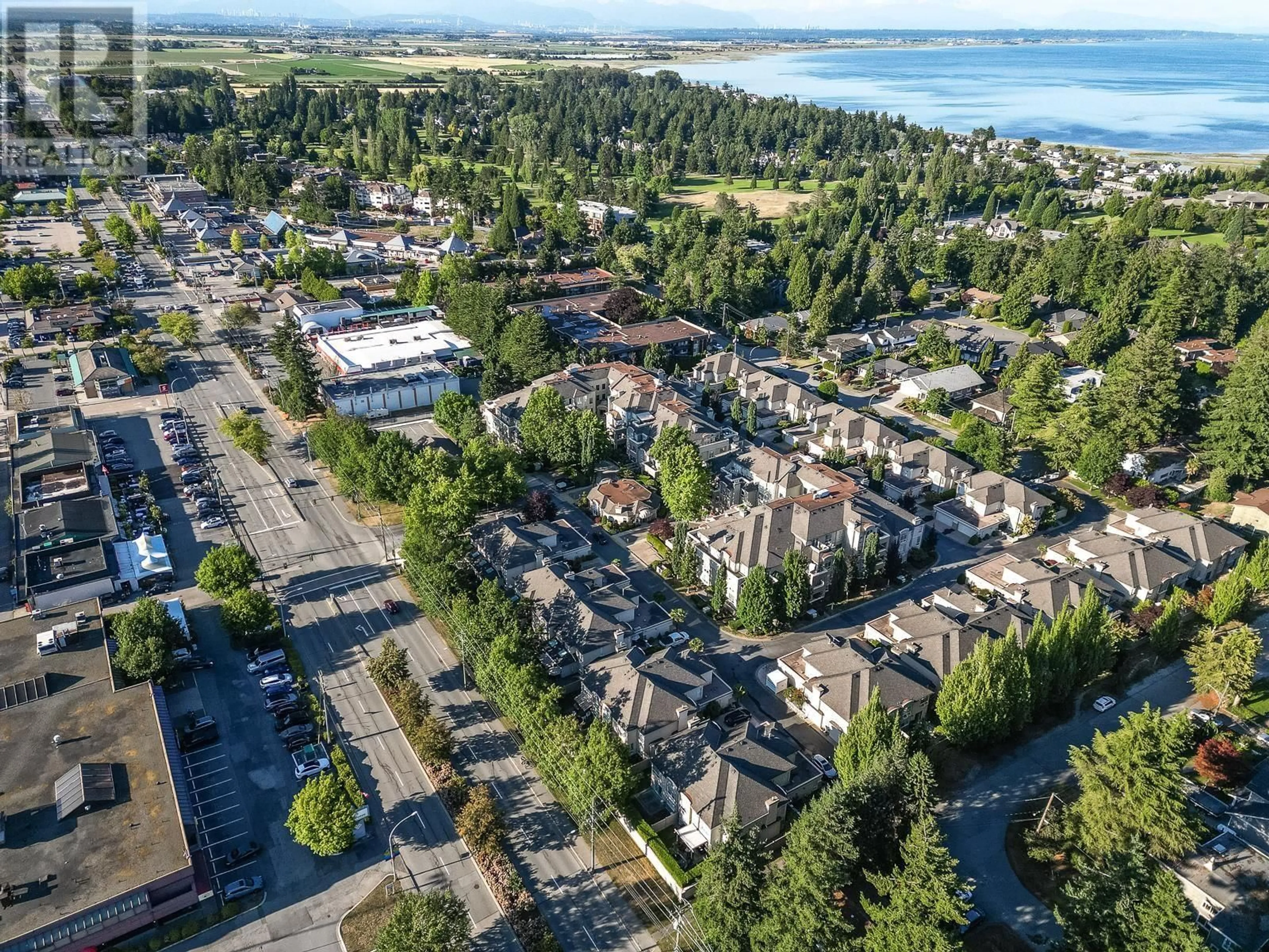 A pic from outside/outdoor area/front of a property/back of a property/a pic from drone, street for 109N - 1100 56 STREET, Delta British Columbia V4L2N2