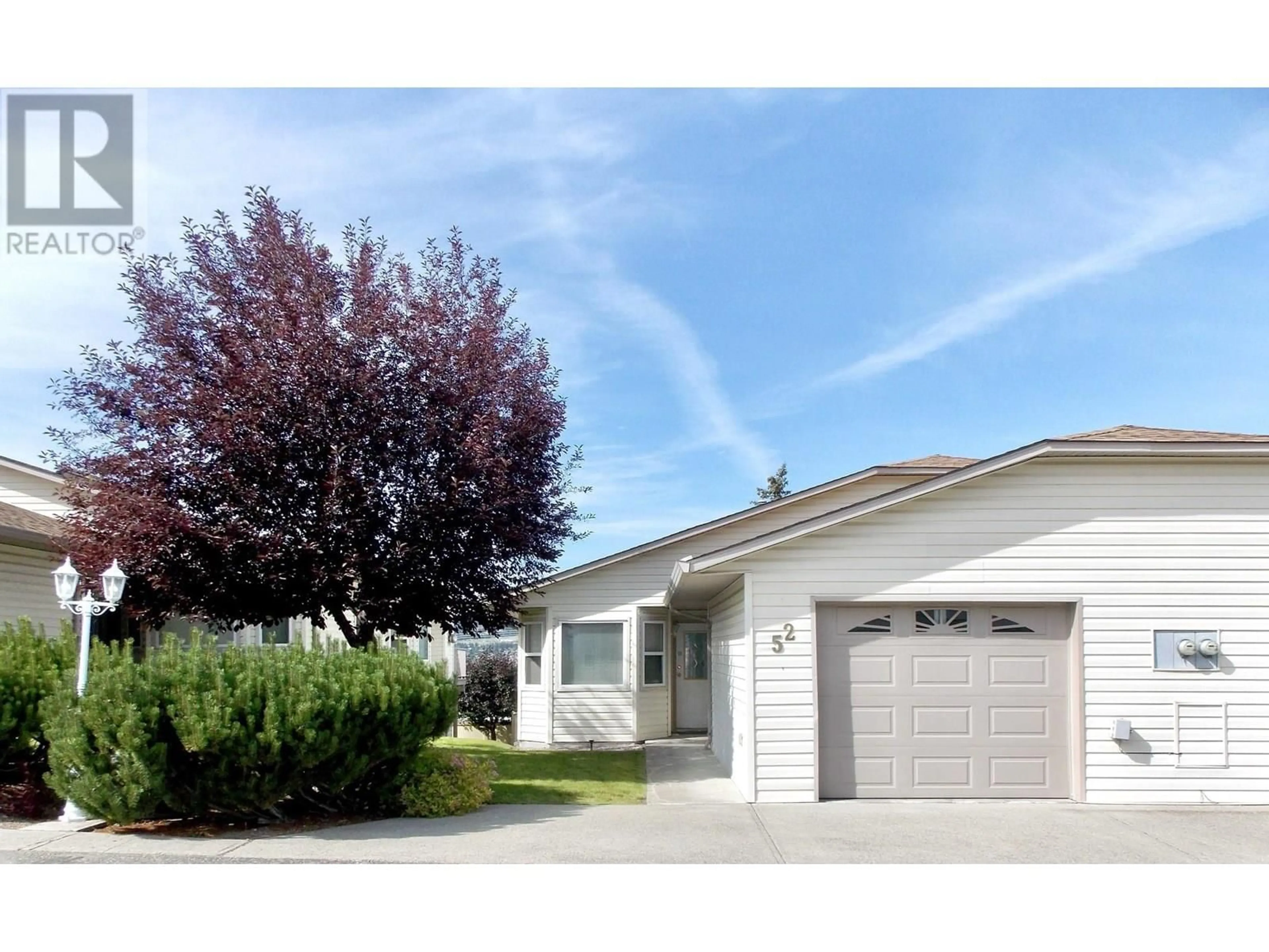 Home with vinyl exterior material, street for 52 - 500 WOTZKE ROAD, Williams Lake British Columbia V2G4S9
