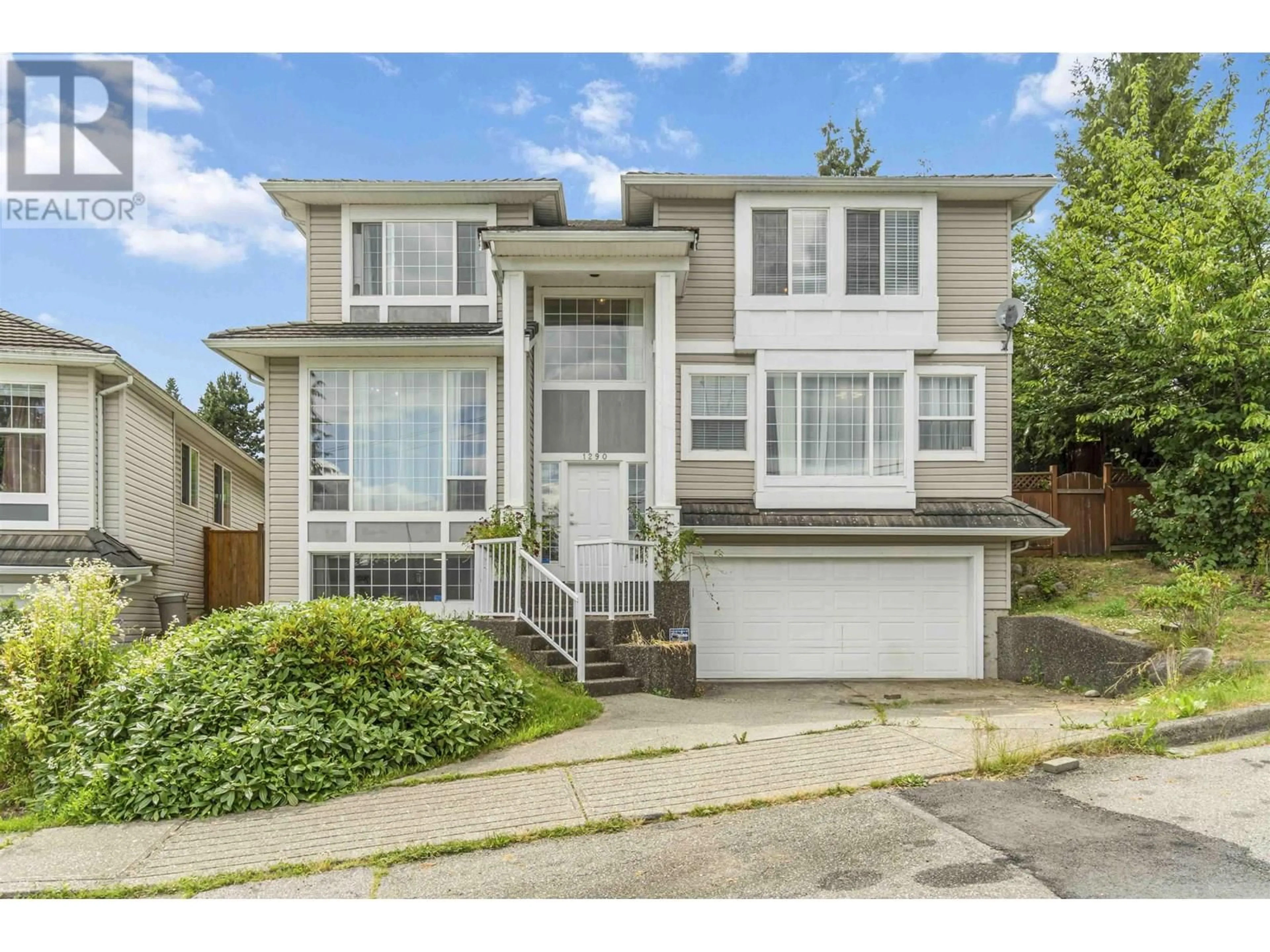 Home with vinyl exterior material, street for 1290 JOHNSON COURT, Coquitlam British Columbia V3B4T6