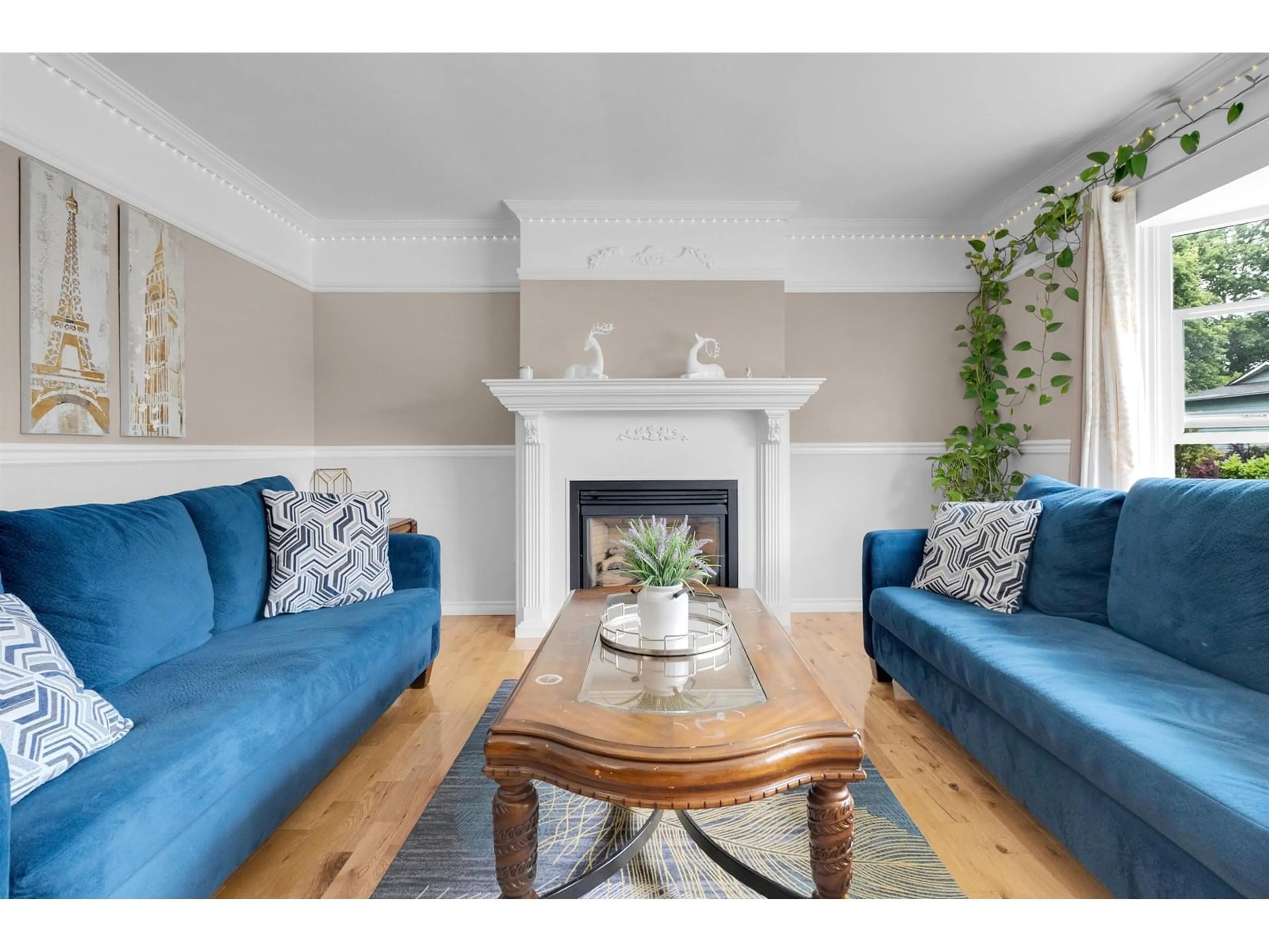 Living room with furniture, wood/laminate floor for 17460 61B, Surrey British Columbia V3S5K6