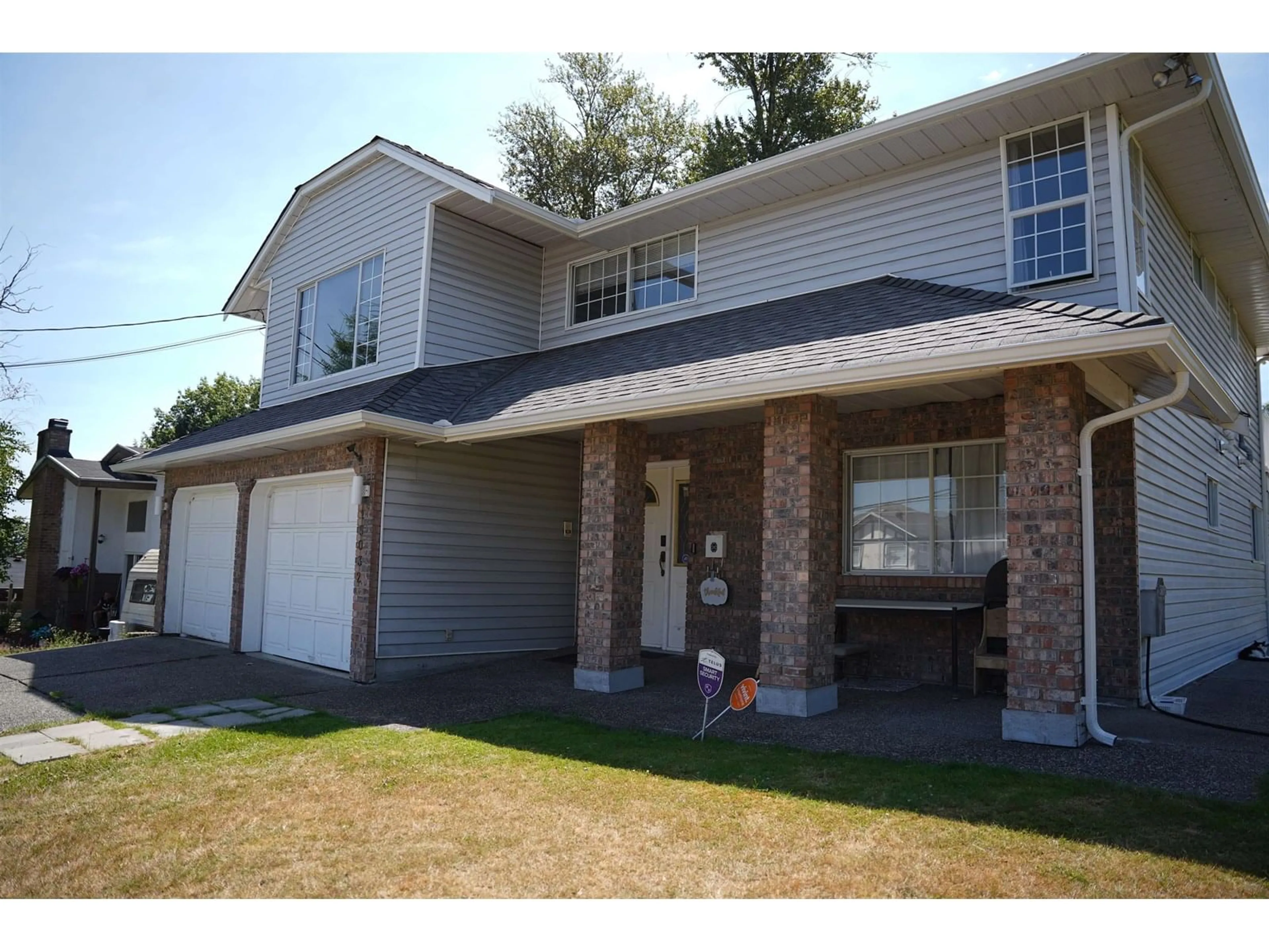 Home with vinyl exterior material, street for 15032 70A, Surrey British Columbia V3S2E2