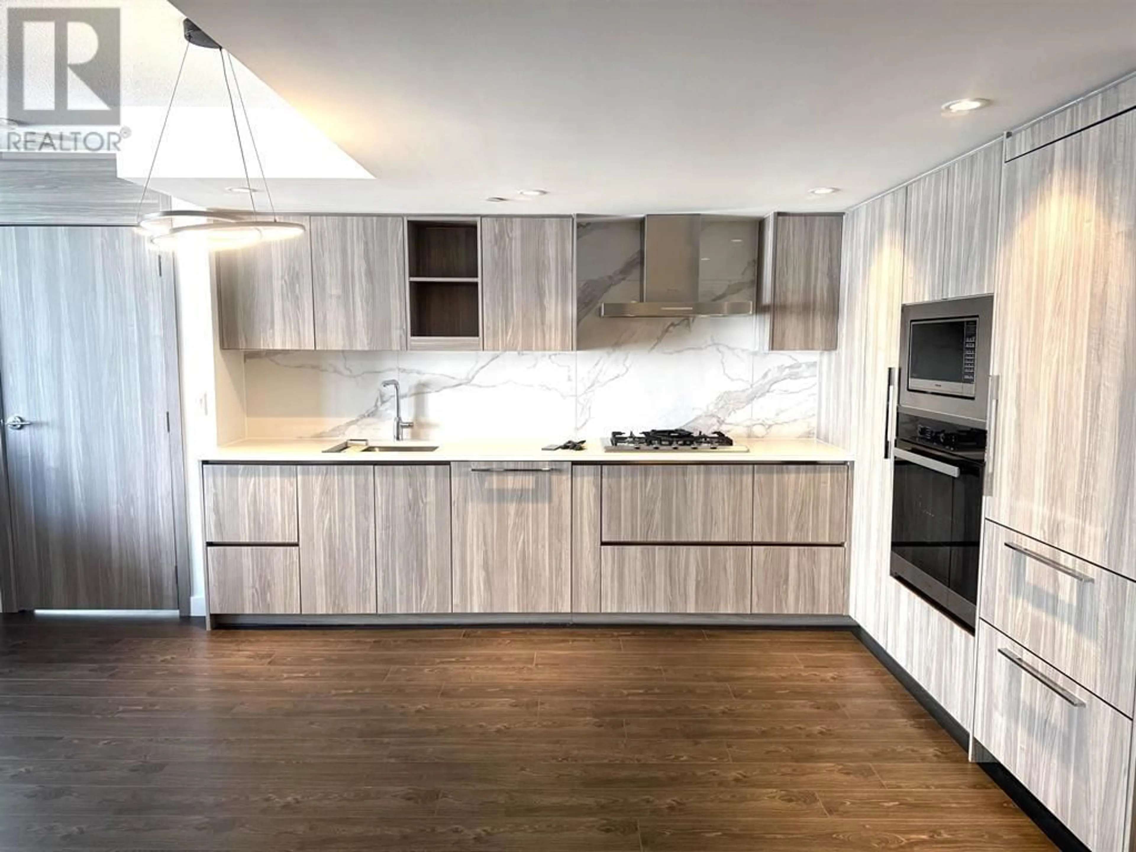 Contemporary kitchen, wood/laminate floor for 510 - 8555 CAPSTAN WAY, Richmond British Columbia V6X0W1