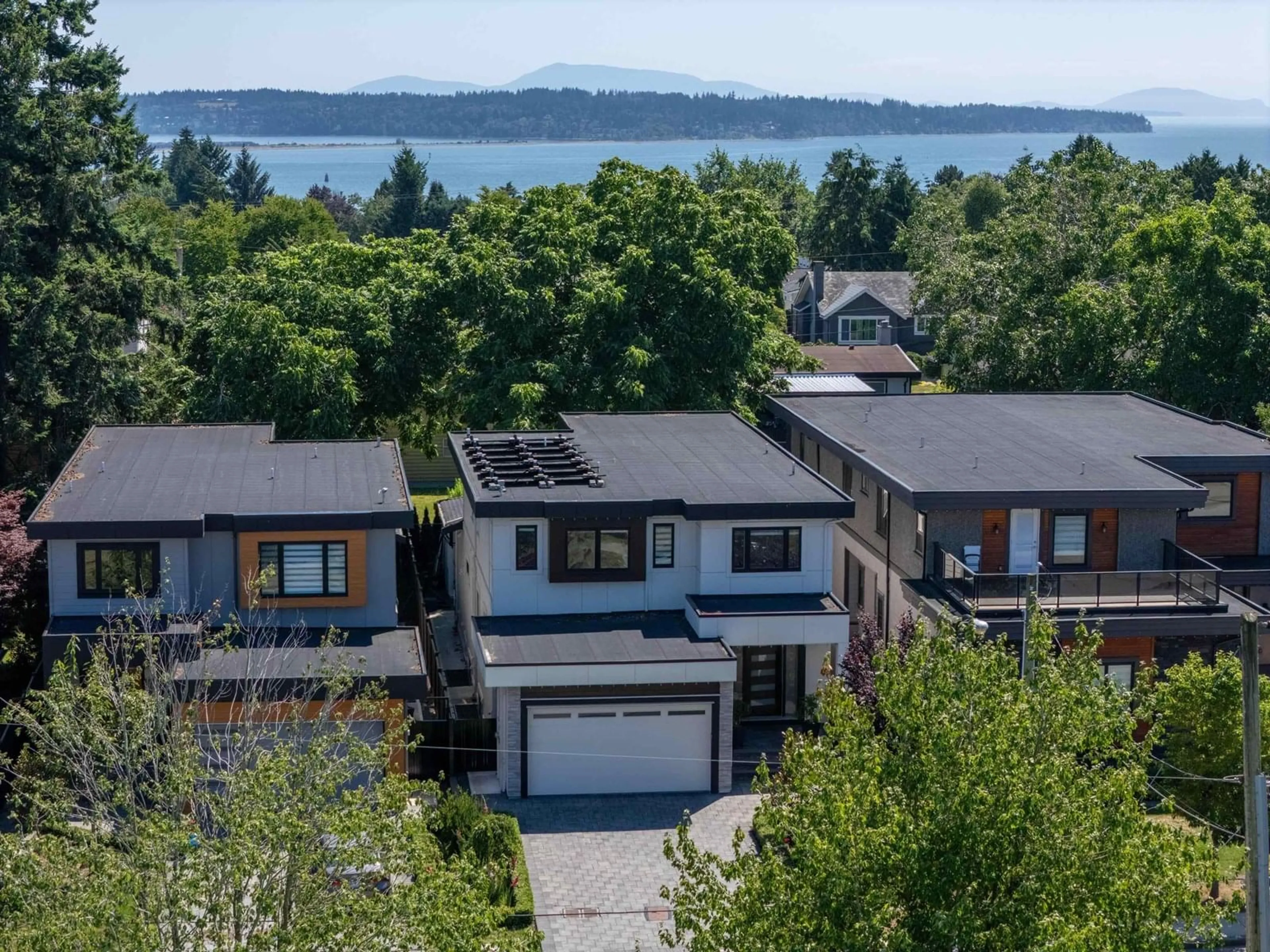 A pic from outside/outdoor area/front of a property/back of a property/a pic from drone, water/lake/river/ocean view for 15890 ROPER, White Rock British Columbia V4B2H4