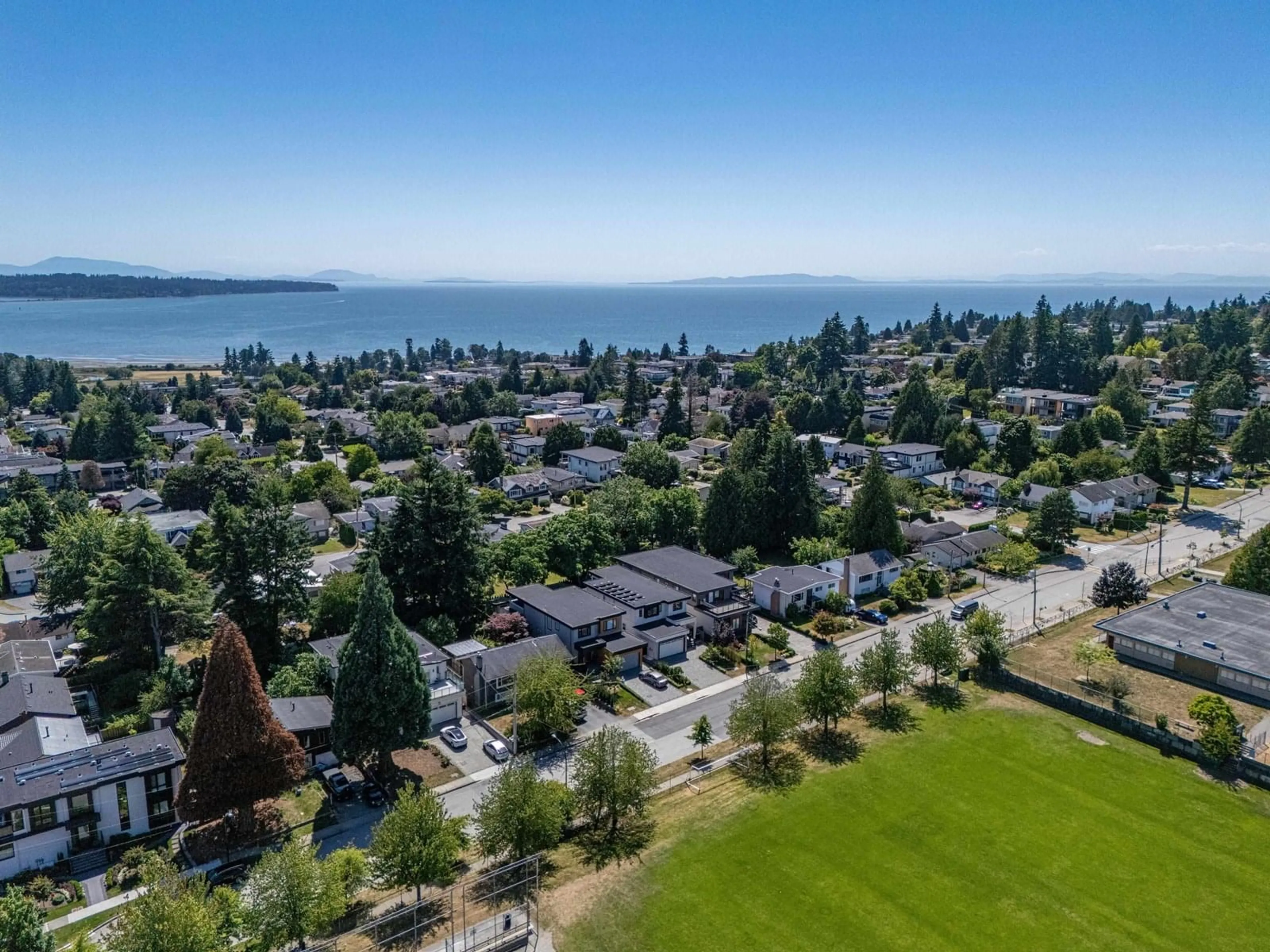 A pic from outside/outdoor area/front of a property/back of a property/a pic from drone, water/lake/river/ocean view for 15890 ROPER, White Rock British Columbia V4B2H4