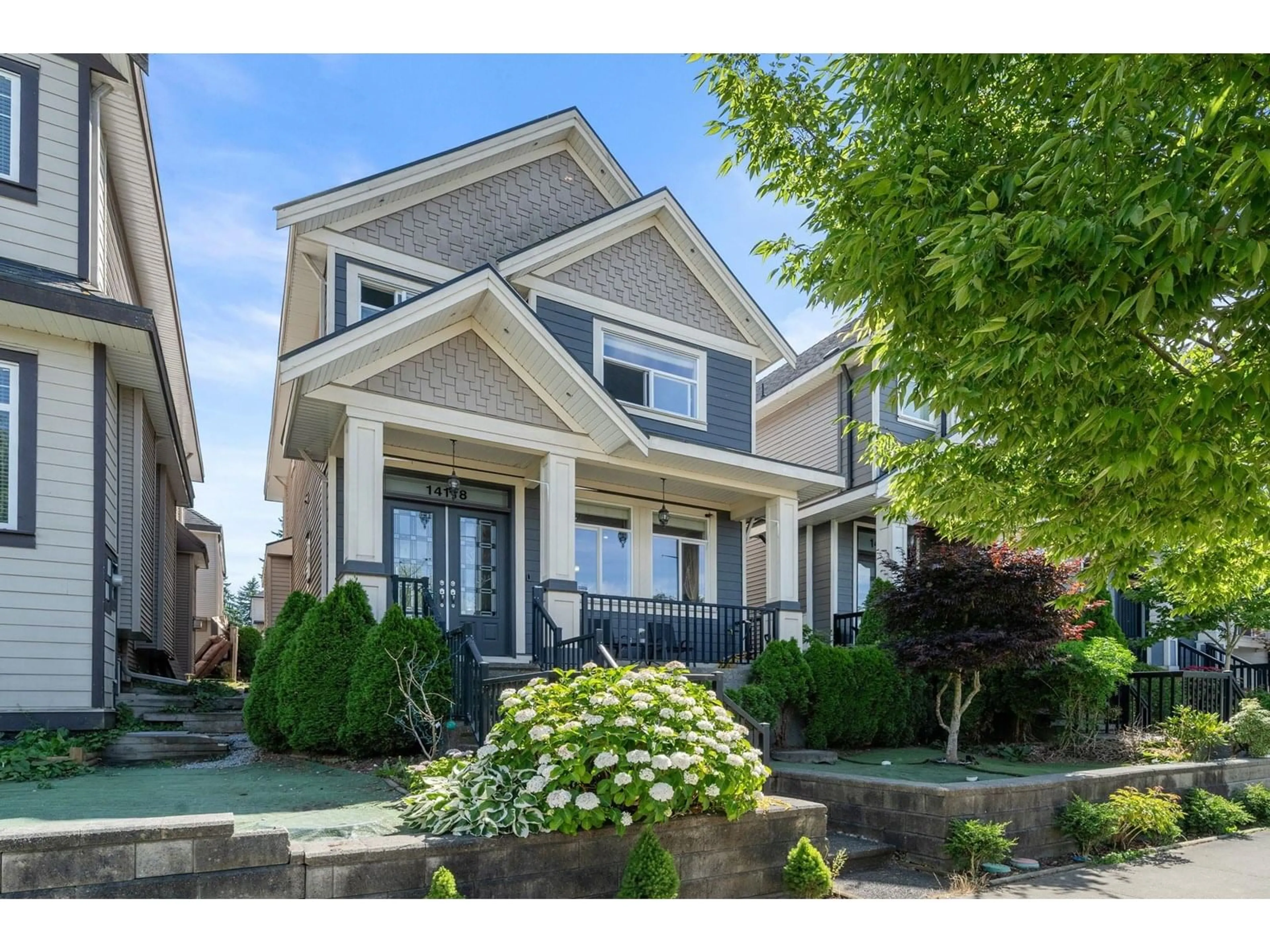 Home with vinyl exterior material, street for 14118 60A, Surrey British Columbia V3X0G1