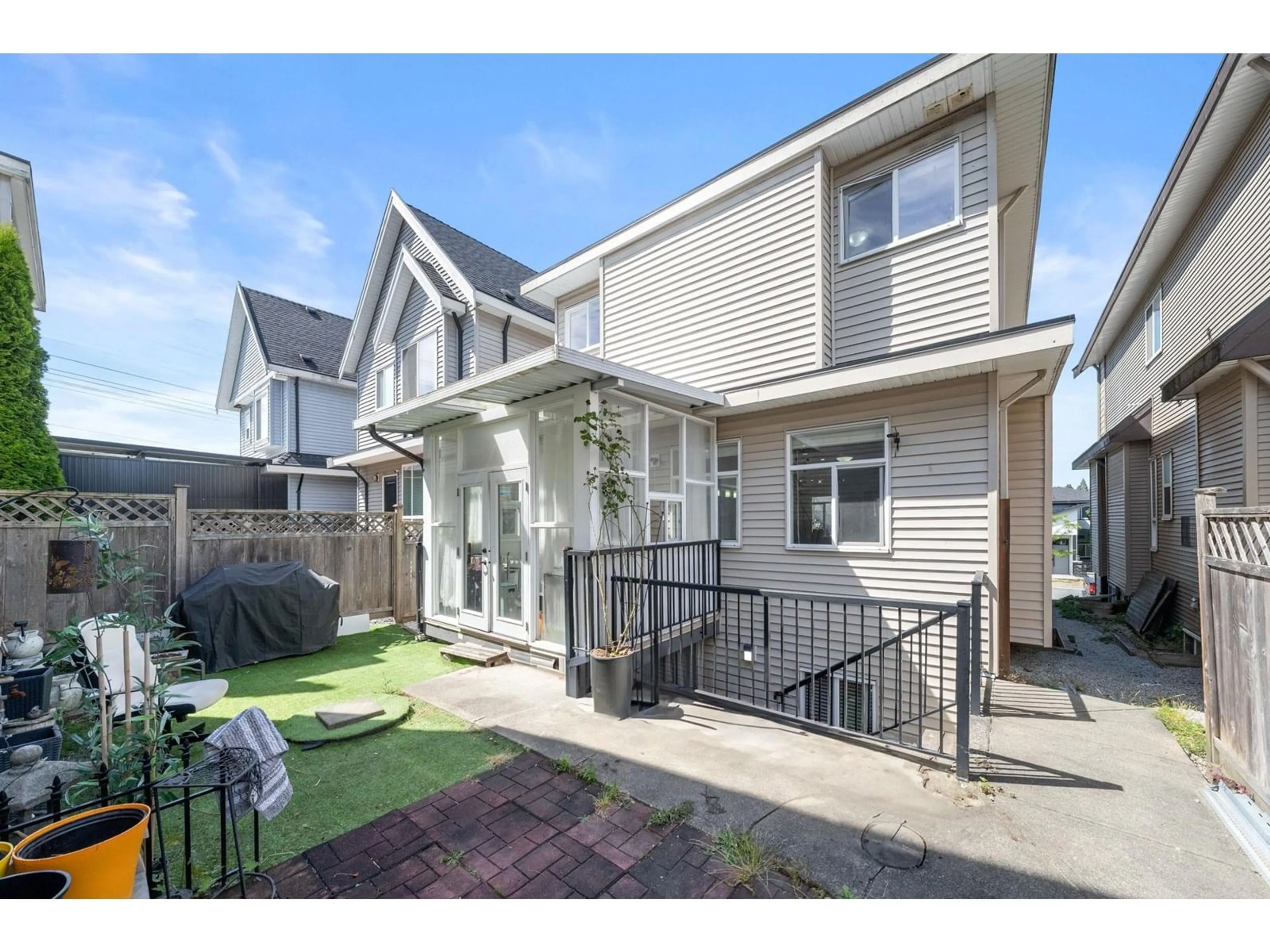 A pic from outside/outdoor area/front of a property/back of a property/a pic from drone, street for 14118 60A, Surrey British Columbia V3X0G1