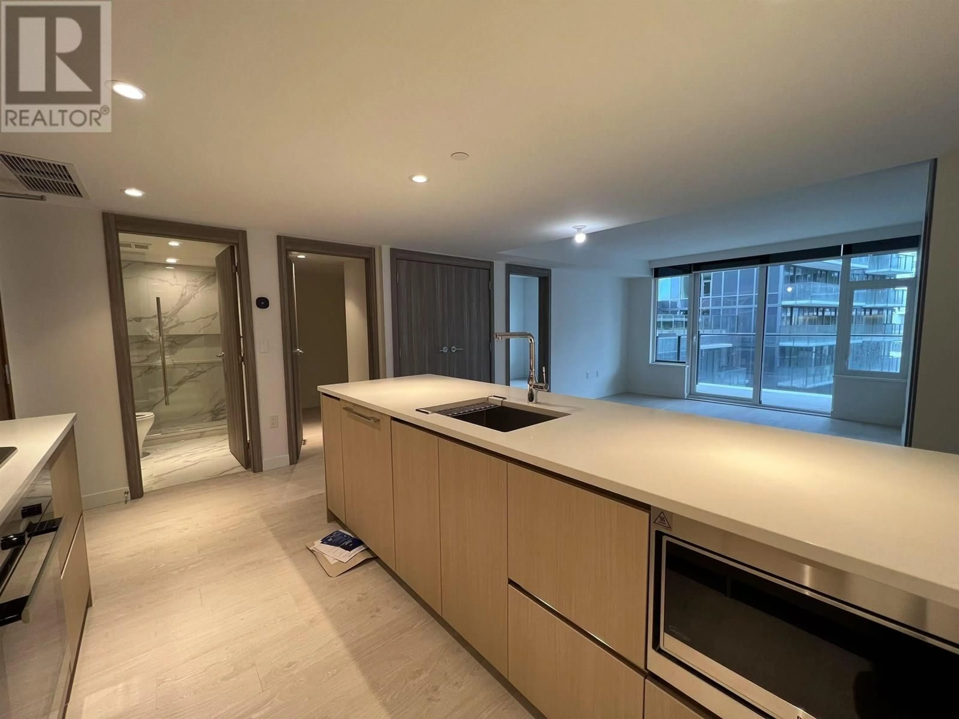 Open concept kitchen, unknown for 611 - 8555 CAPSTAN WAY, Richmond British Columbia V6X0W1