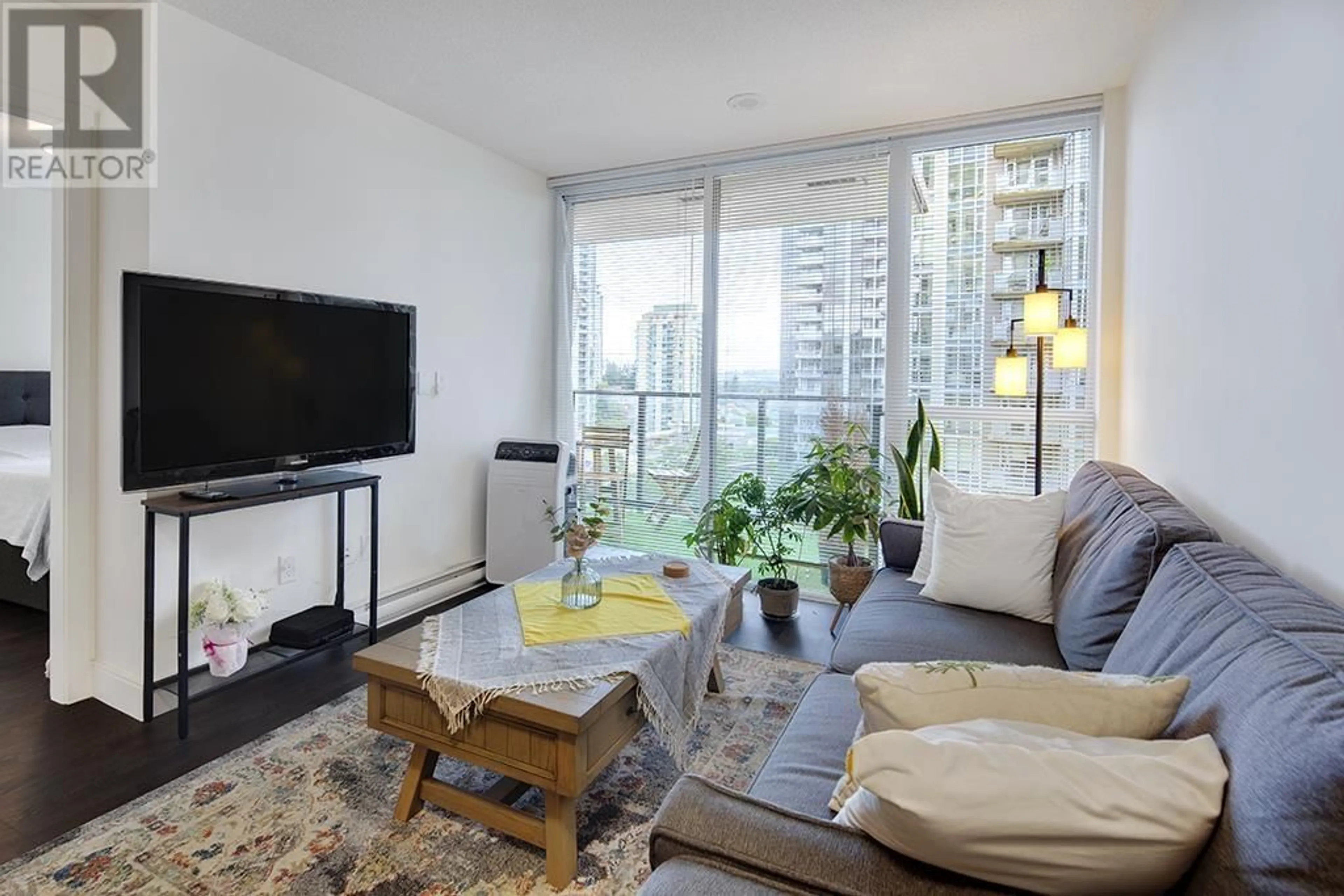 Living room with furniture, unknown for 1106 - 3007 GLEN DRIVE, Coquitlam British Columbia V3B0L8