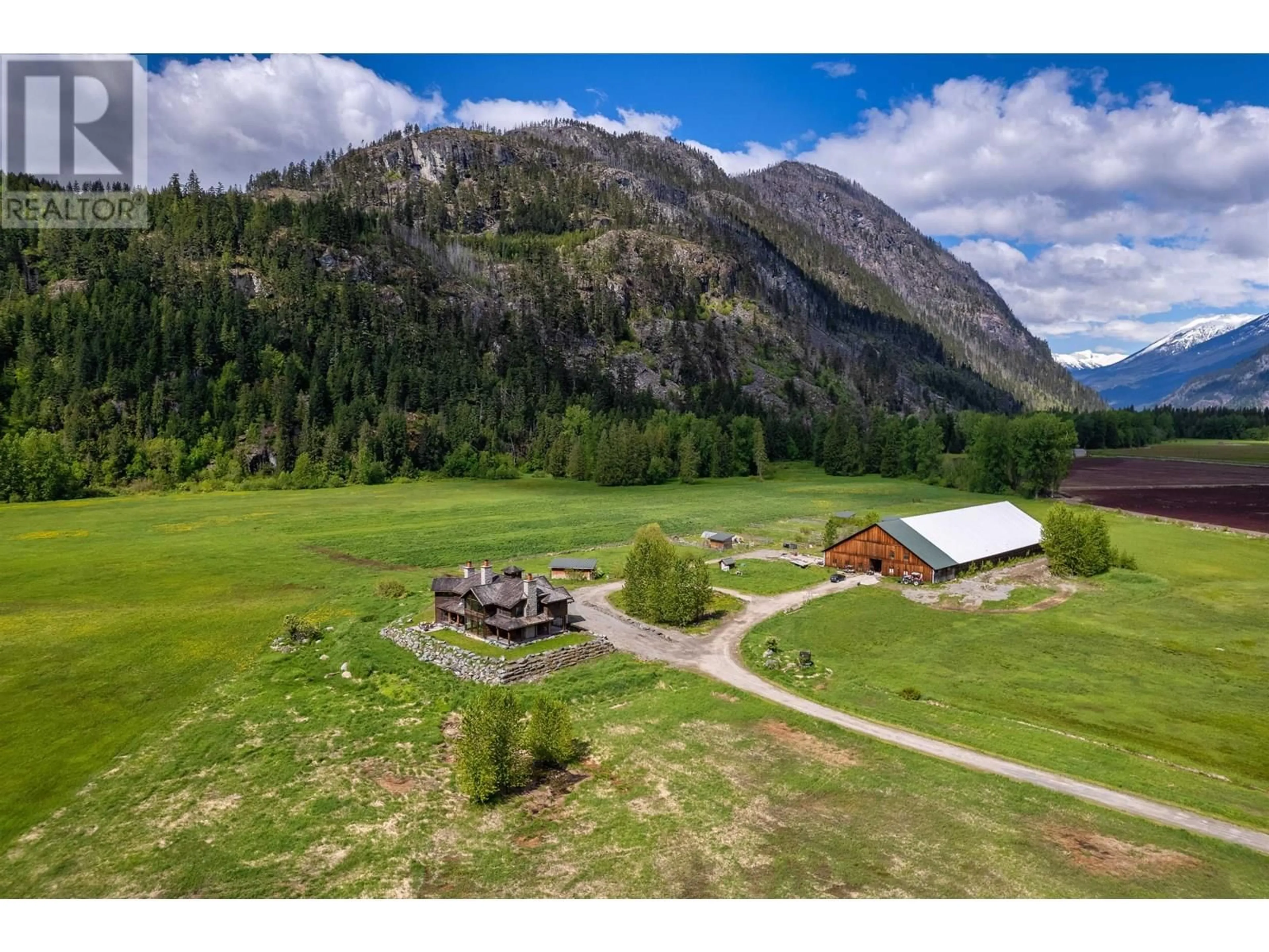 A pic from outside/outdoor area/front of a property/back of a property/a pic from drone, mountain view for 9115 PEMBERTON MEADOWS ROAD, Pemberton British Columbia V0N2L2