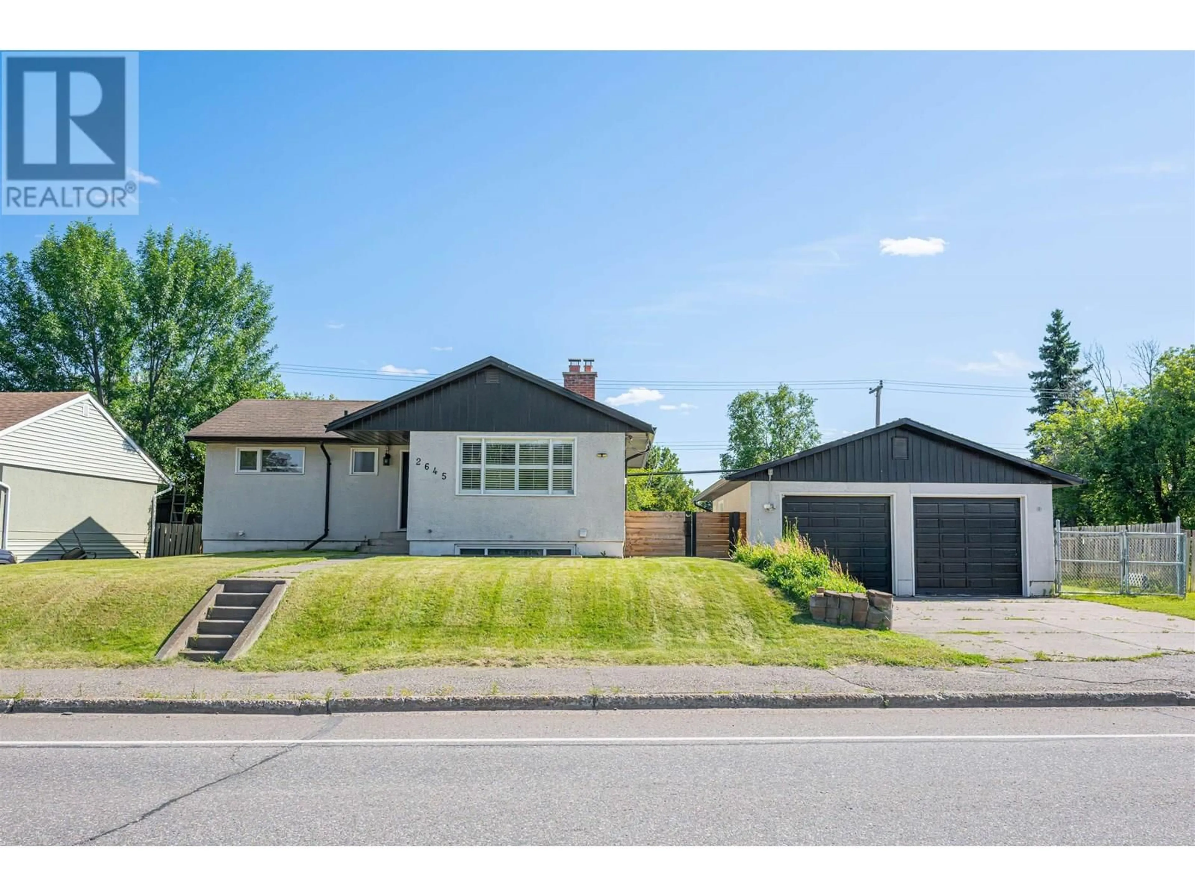 A pic from outside/outdoor area/front of a property/back of a property/a pic from drone, street for 2645 15TH AVENUE, Prince George British Columbia V2M1S8