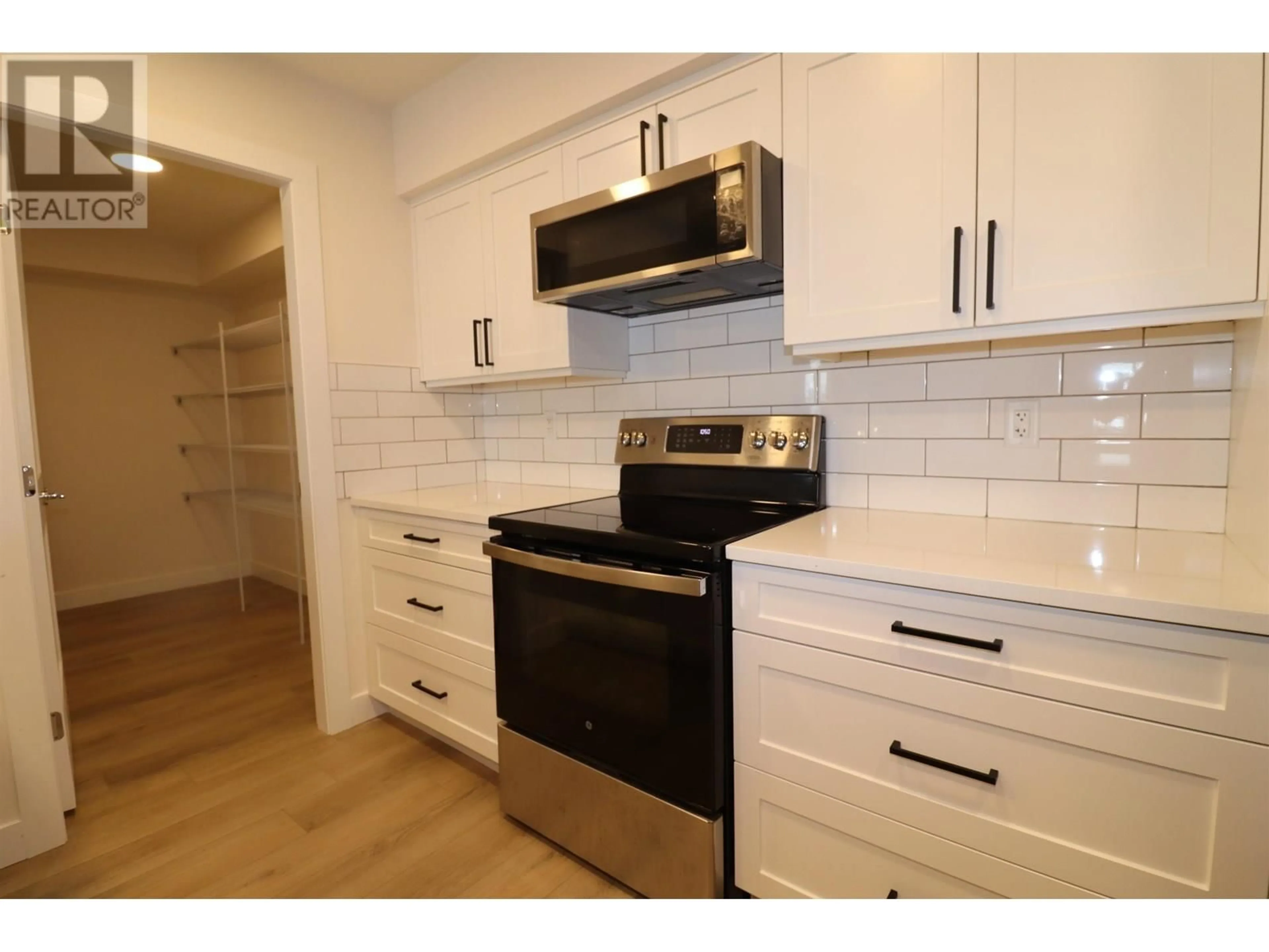 Standard kitchen, wood/laminate floor for 105 - 4278 22ND AVENUE, Prince George British Columbia V2N0J4