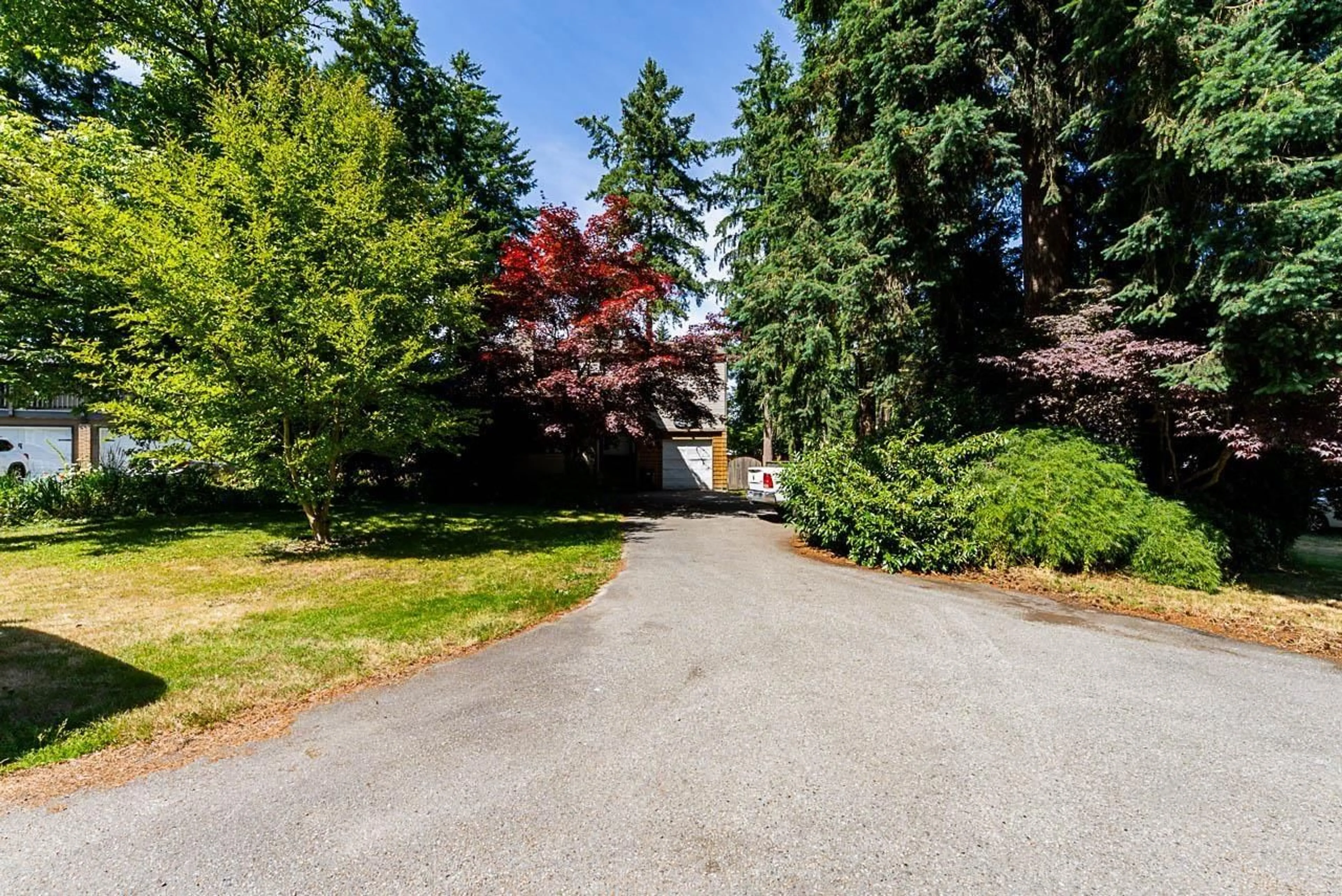 A pic from outside/outdoor area/front of a property/back of a property/a pic from drone, street for 3799 196A, Langley British Columbia V3A5W6