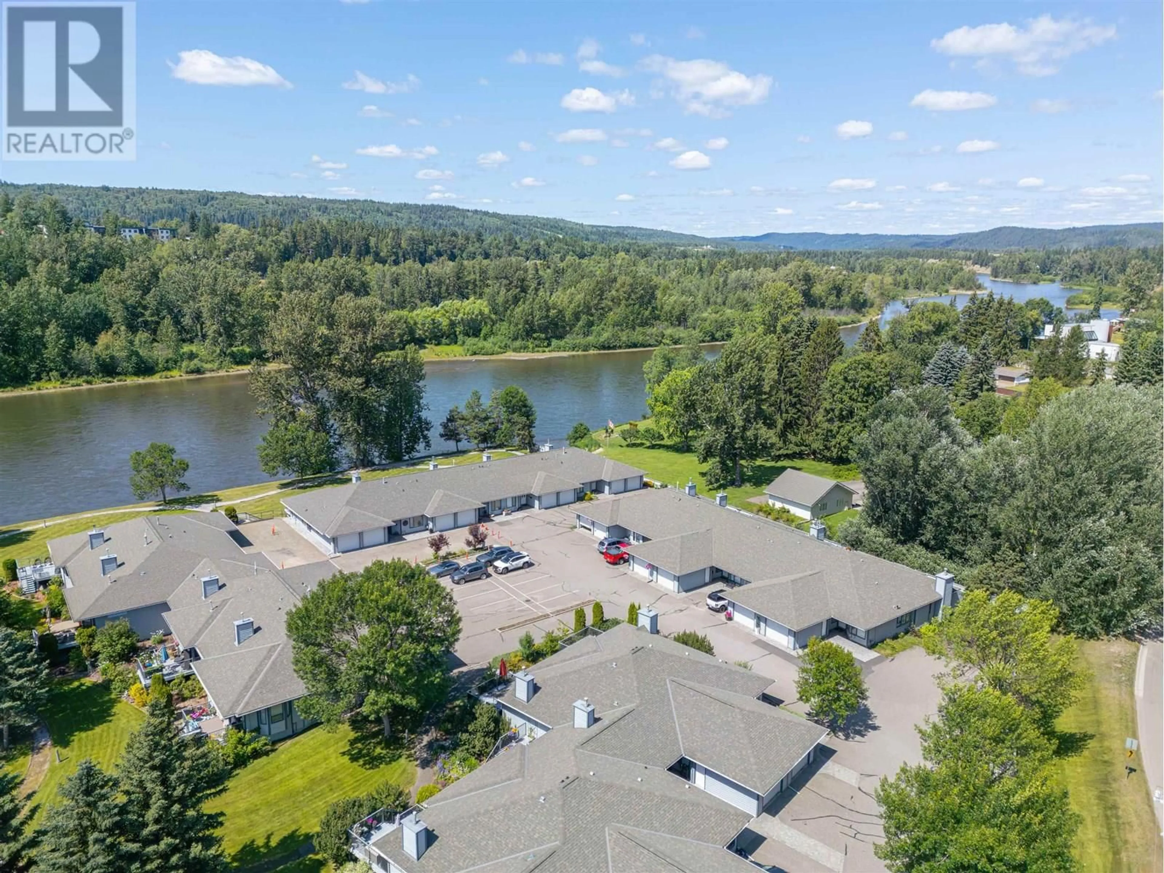 A pic from outside/outdoor area/front of a property/back of a property/a pic from drone, water/lake/river/ocean view for 111 - 801 PRESTON ROAD, Prince George British Columbia V2K4S5
