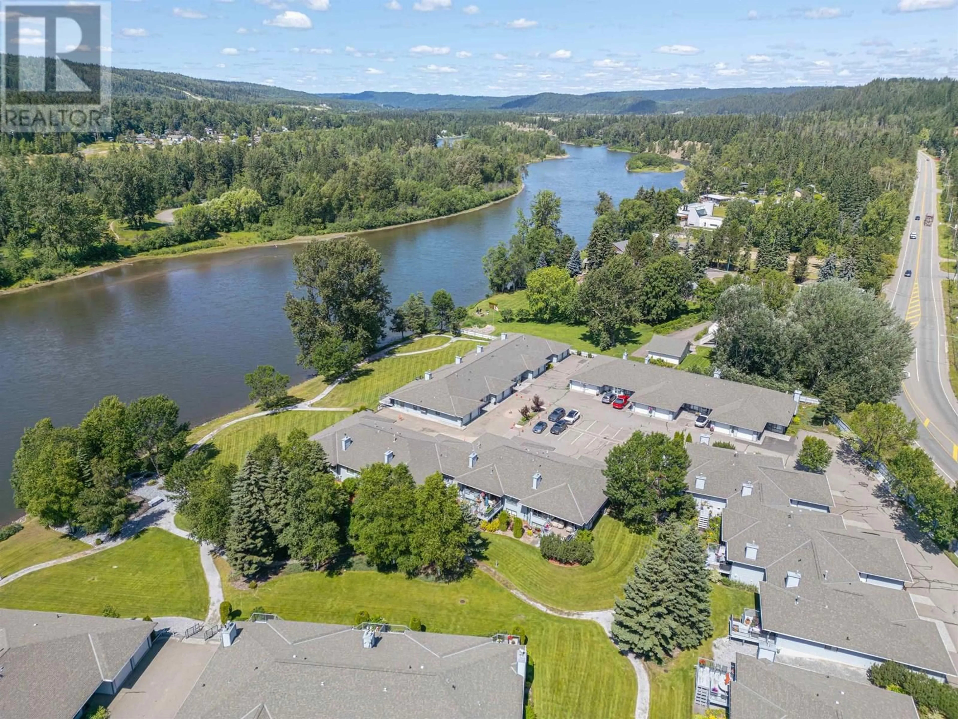 A pic from outside/outdoor area/front of a property/back of a property/a pic from drone, water/lake/river/ocean view for 111 - 801 PRESTON ROAD, Prince George British Columbia V2K4S5