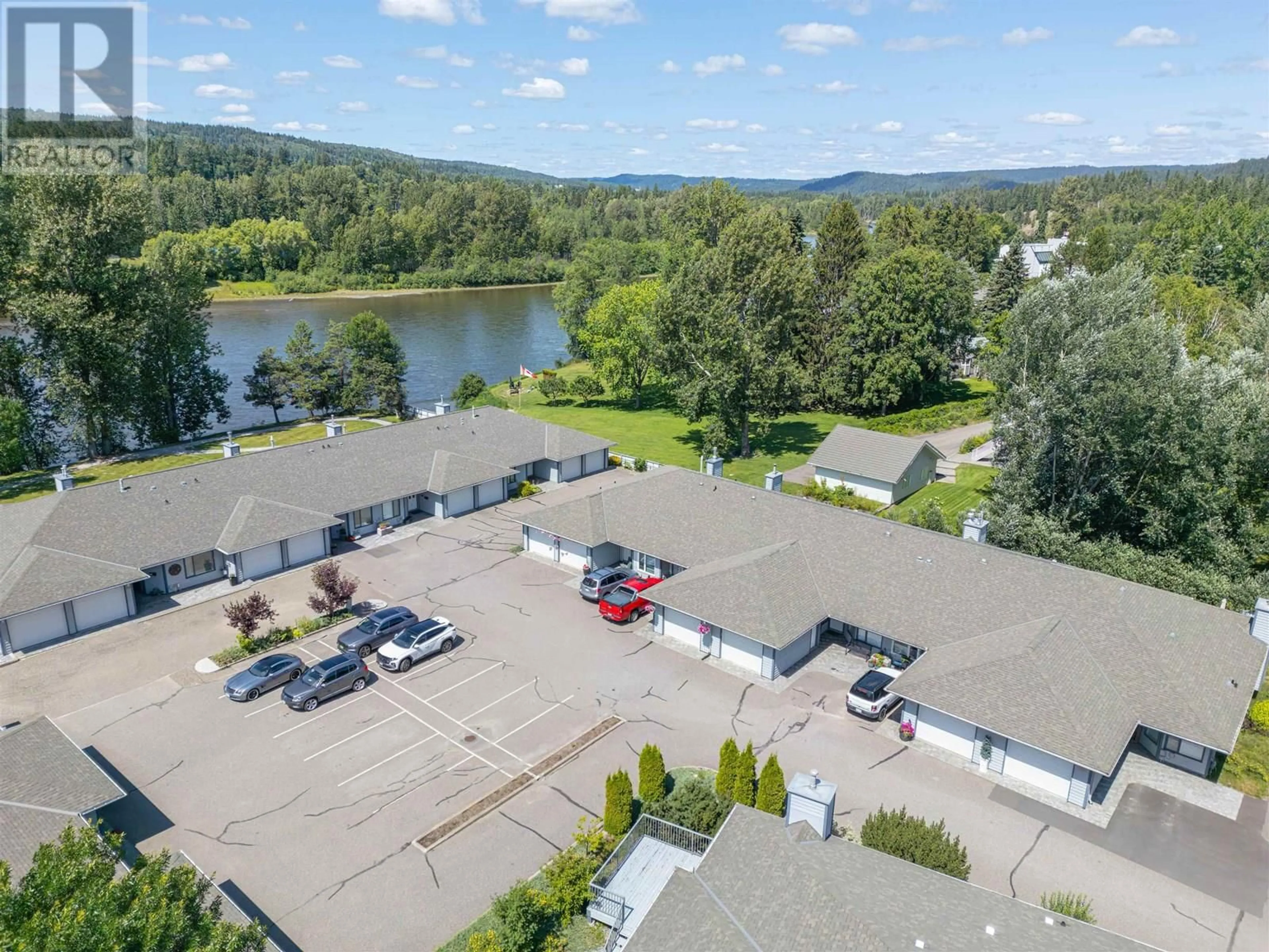 A pic from outside/outdoor area/front of a property/back of a property/a pic from drone, water/lake/river/ocean view for 111 - 801 PRESTON ROAD, Prince George British Columbia V2K4S5