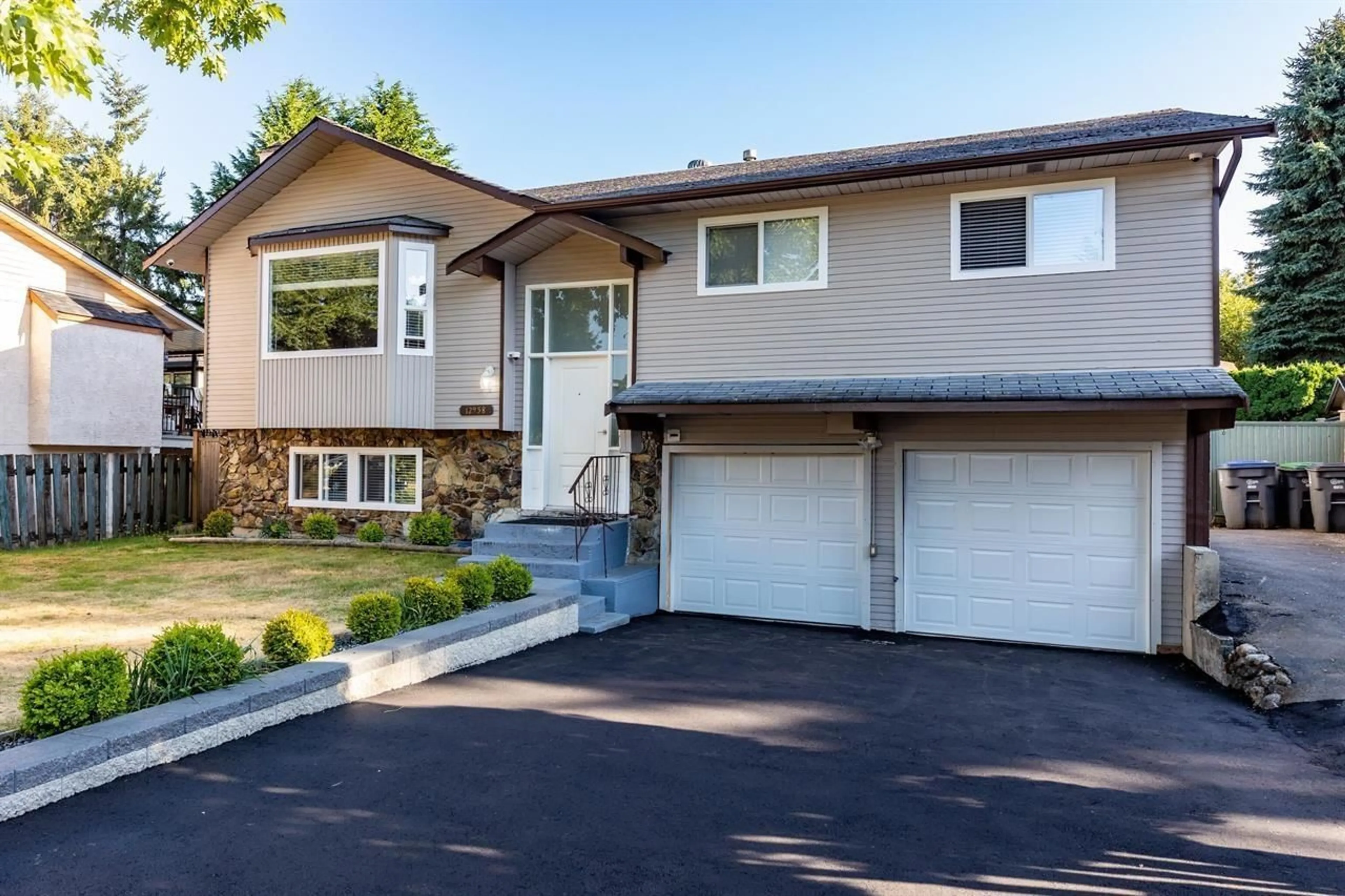 Home with vinyl exterior material, street for 12958 65A, Surrey British Columbia V3W7H7