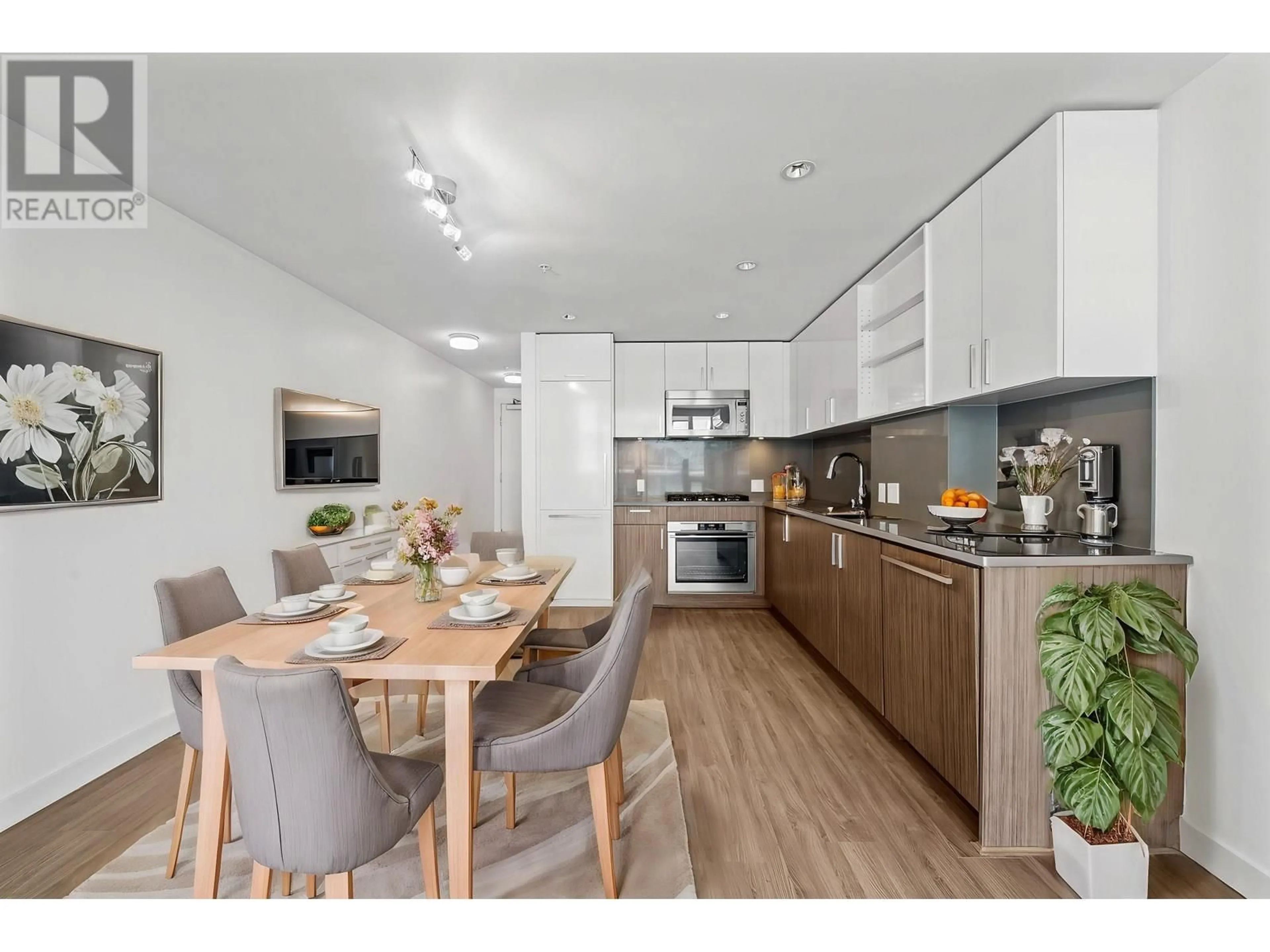 Open concept kitchen, wood/laminate floor for 805 - 5599 COONEY ROAD, Richmond British Columbia V6X0N8