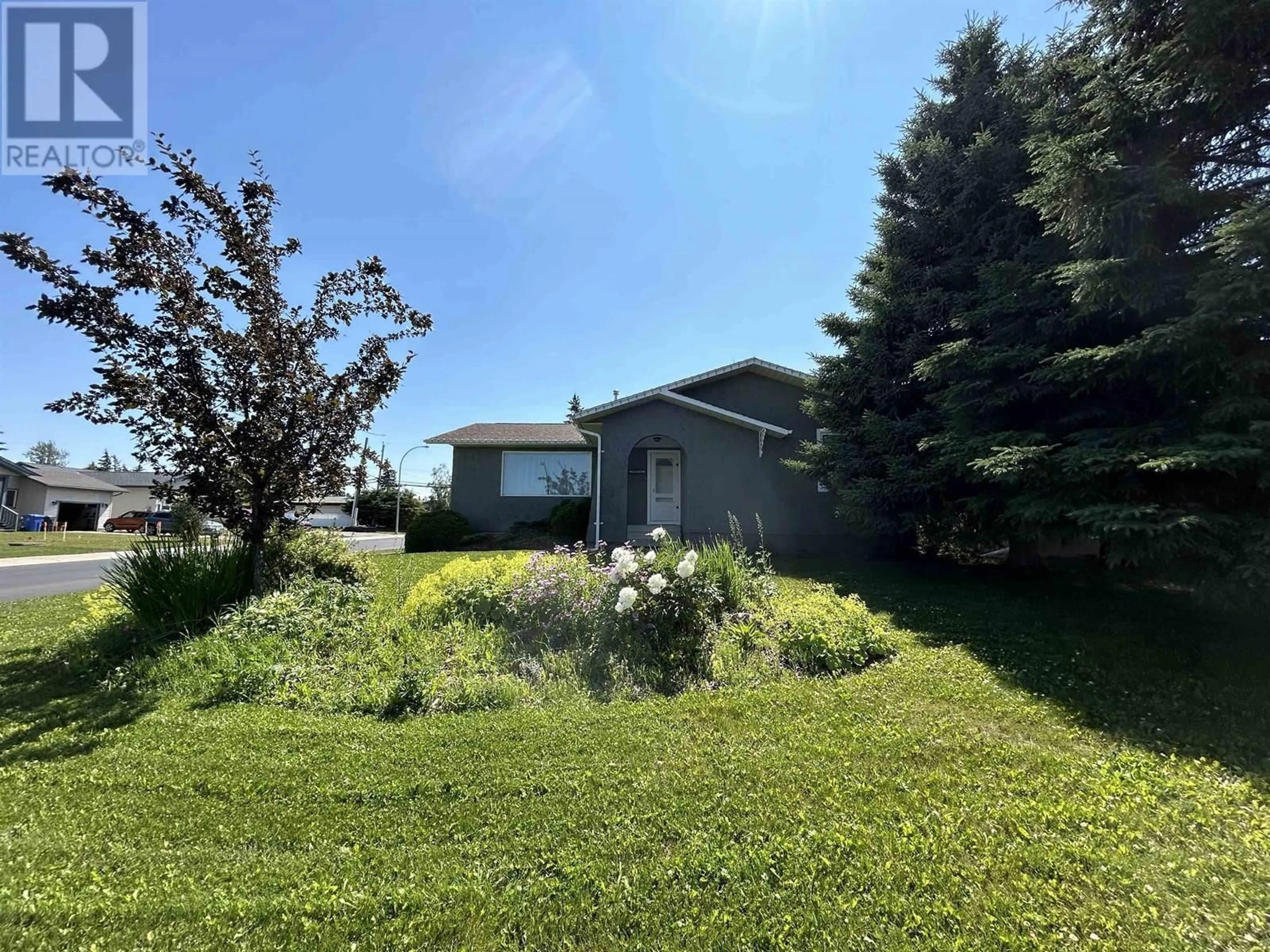 A pic from outside/outdoor area/front of a property/back of a property/a pic from drone, unknown for 9803 113 AVENUE, Fort St. John British Columbia V1J4P7