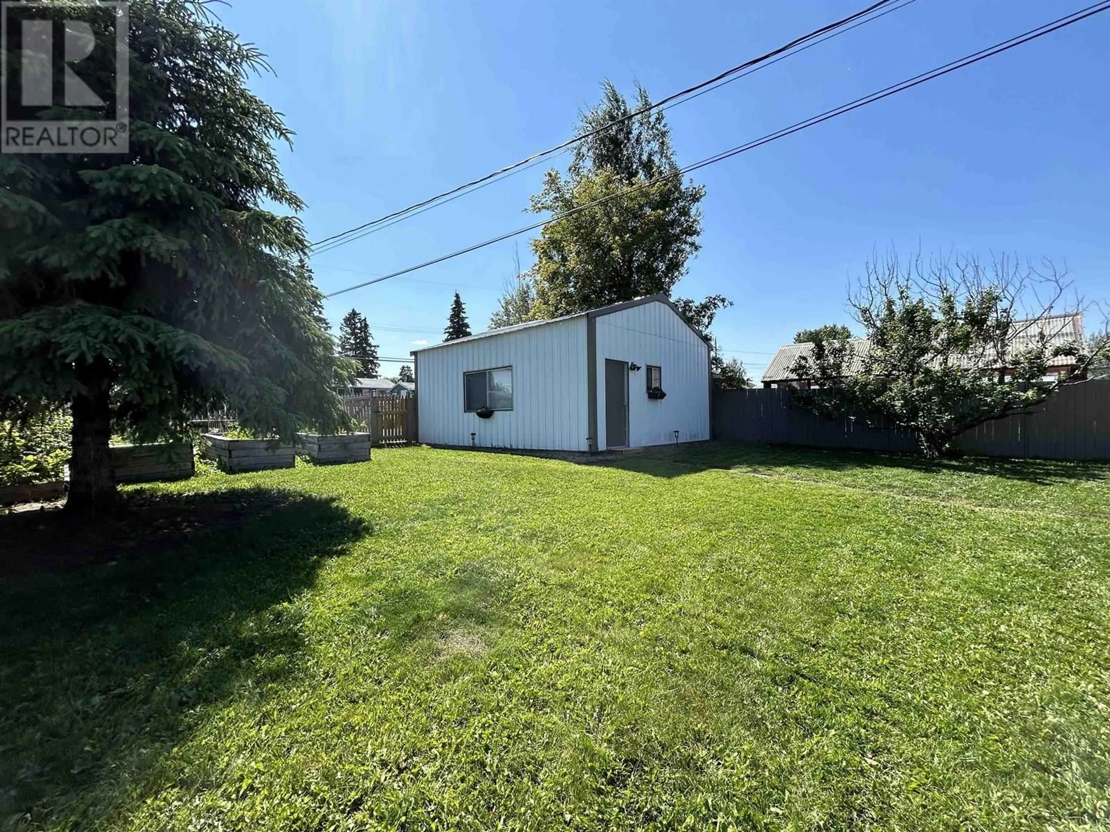 A pic from outside/outdoor area/front of a property/back of a property/a pic from drone, street for 9803 113 AVENUE, Fort St. John British Columbia V1J4P7