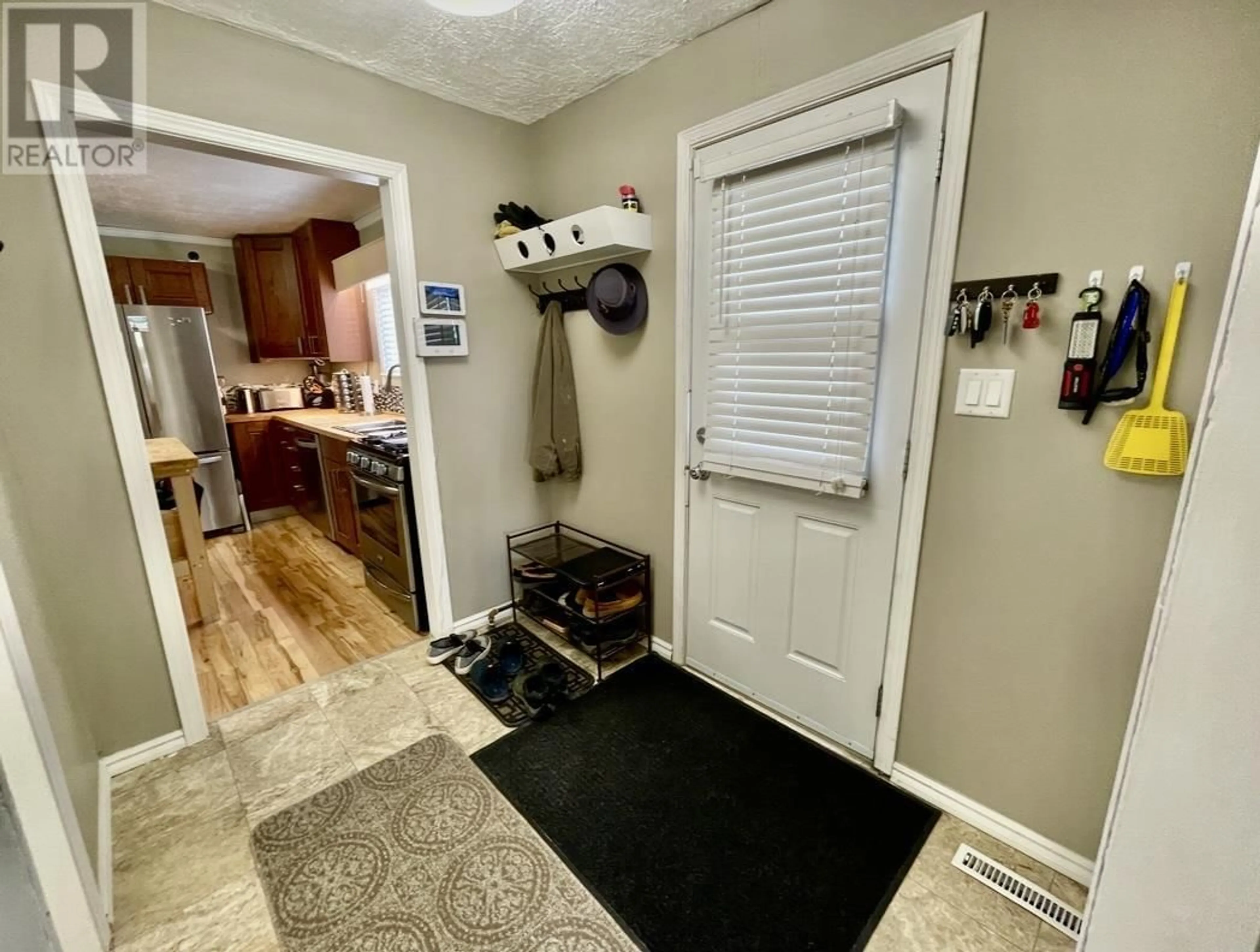 Indoor entryway for 8319 94 AVENUE, Fort St. John British Columbia V1J1E7