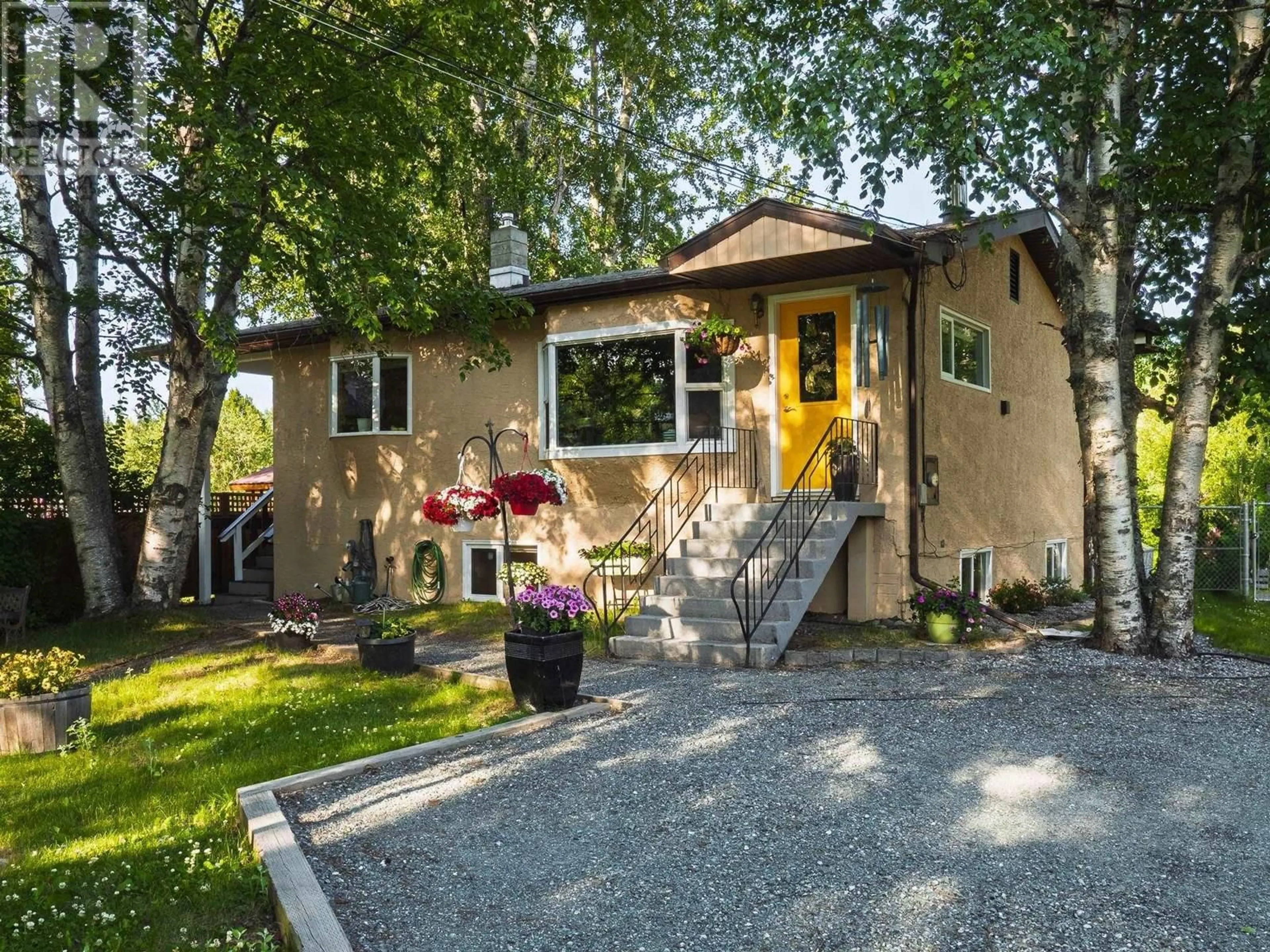 Home with vinyl exterior material, street for 2246 NORTHWOOD PULPMILL ROAD, Prince George British Columbia V2K1K2