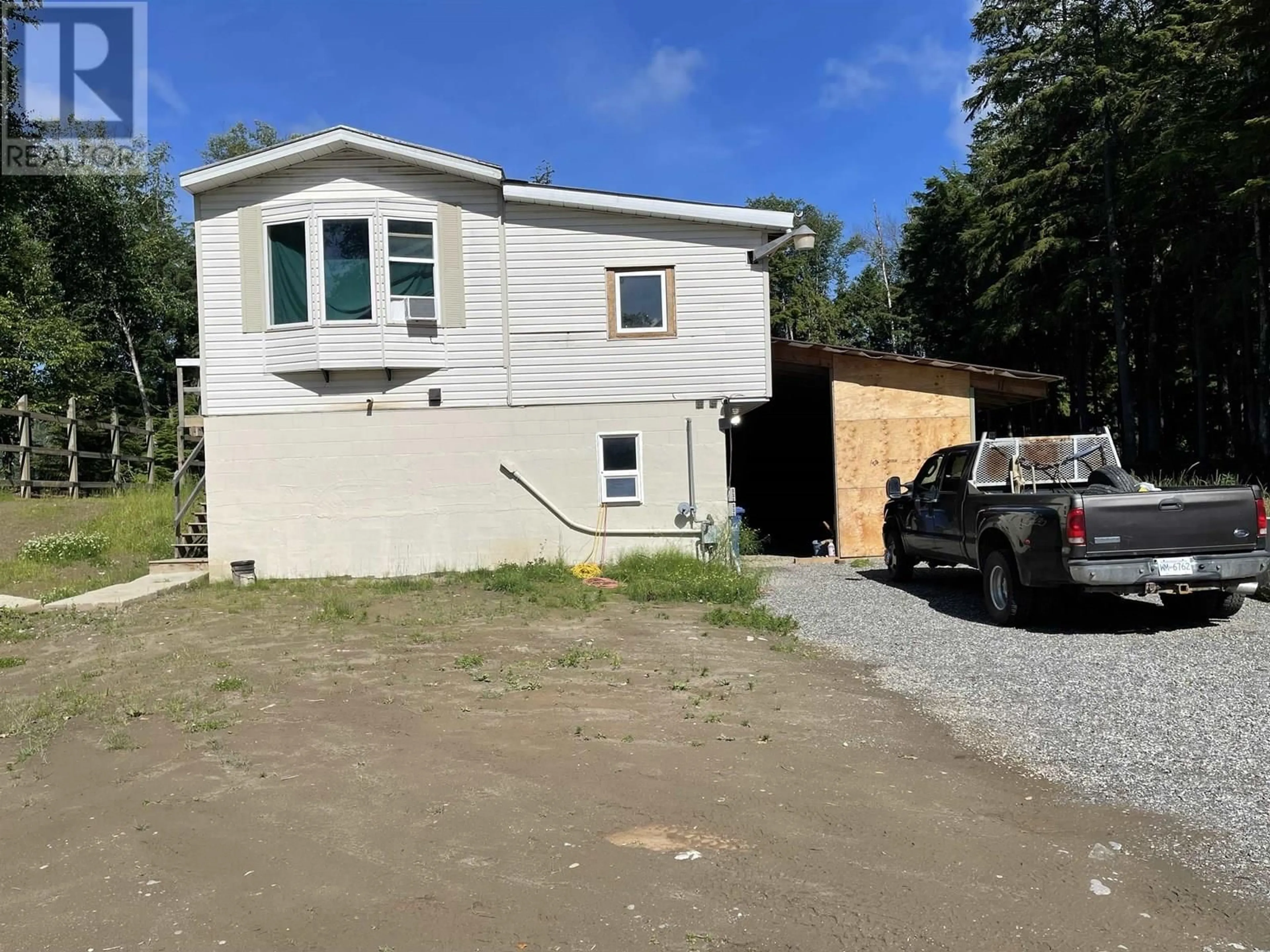 A pic from outside/outdoor area/front of a property/back of a property/a pic from drone, building for 3871 16 HIGHWAY, Terrace British Columbia V8G4L3