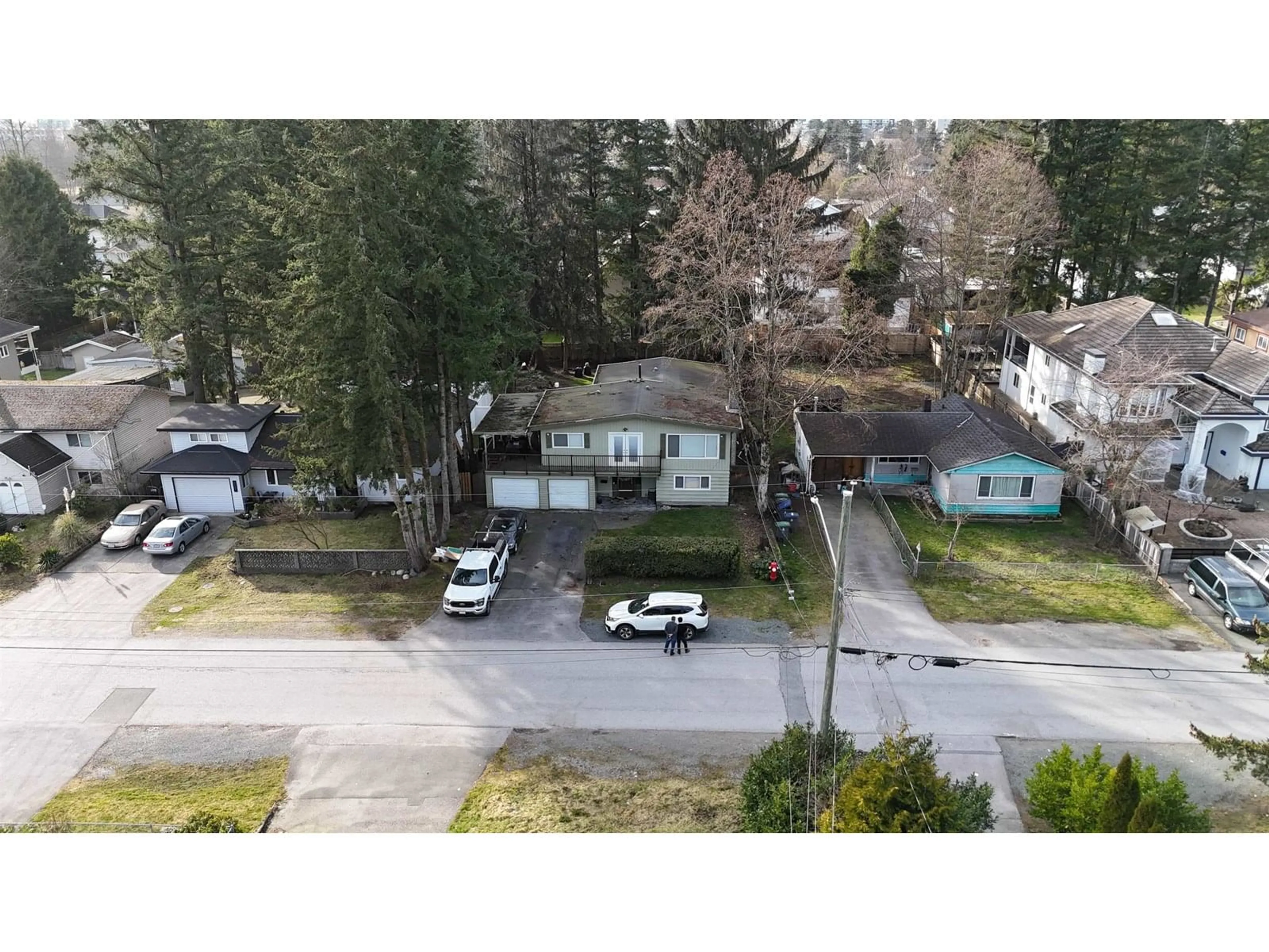 A pic from outside/outdoor area/front of a property/back of a property/a pic from drone, street for 10677 142, Surrey British Columbia V3T4S6