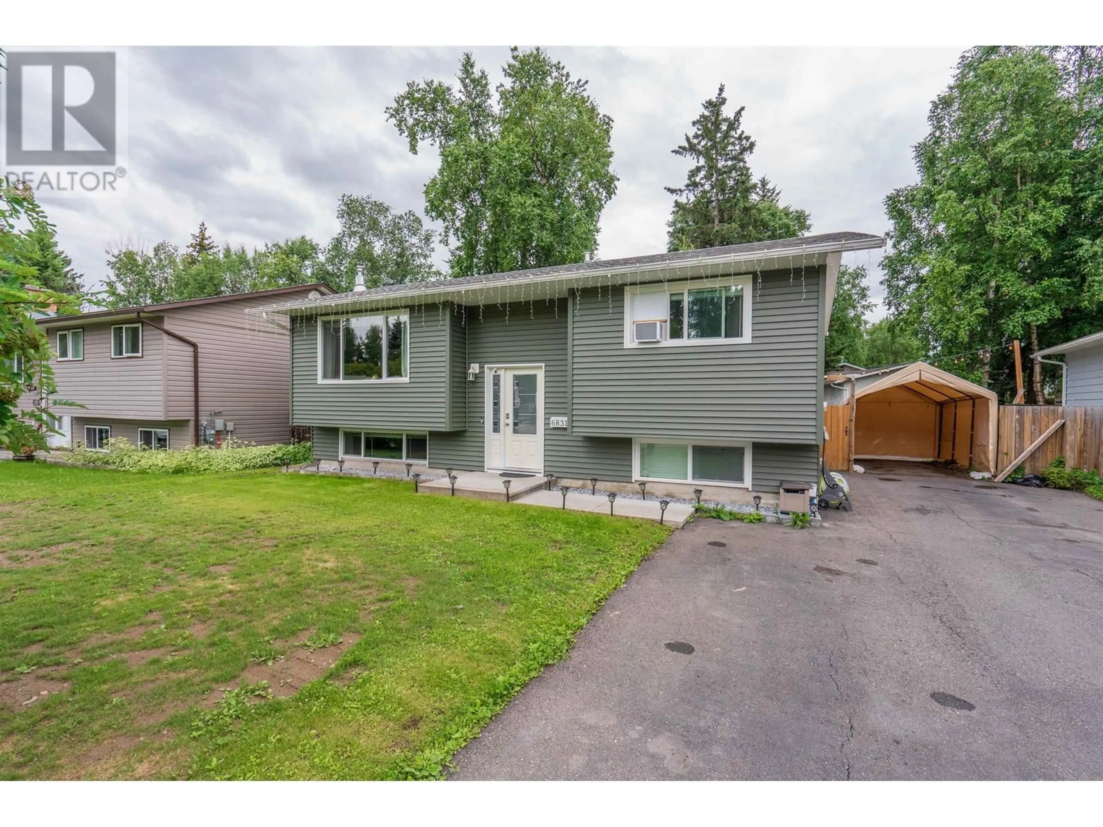 Home with vinyl exterior material, street for 6831 FAIRMONT CRESCENT, Prince George British Columbia V2N2P6