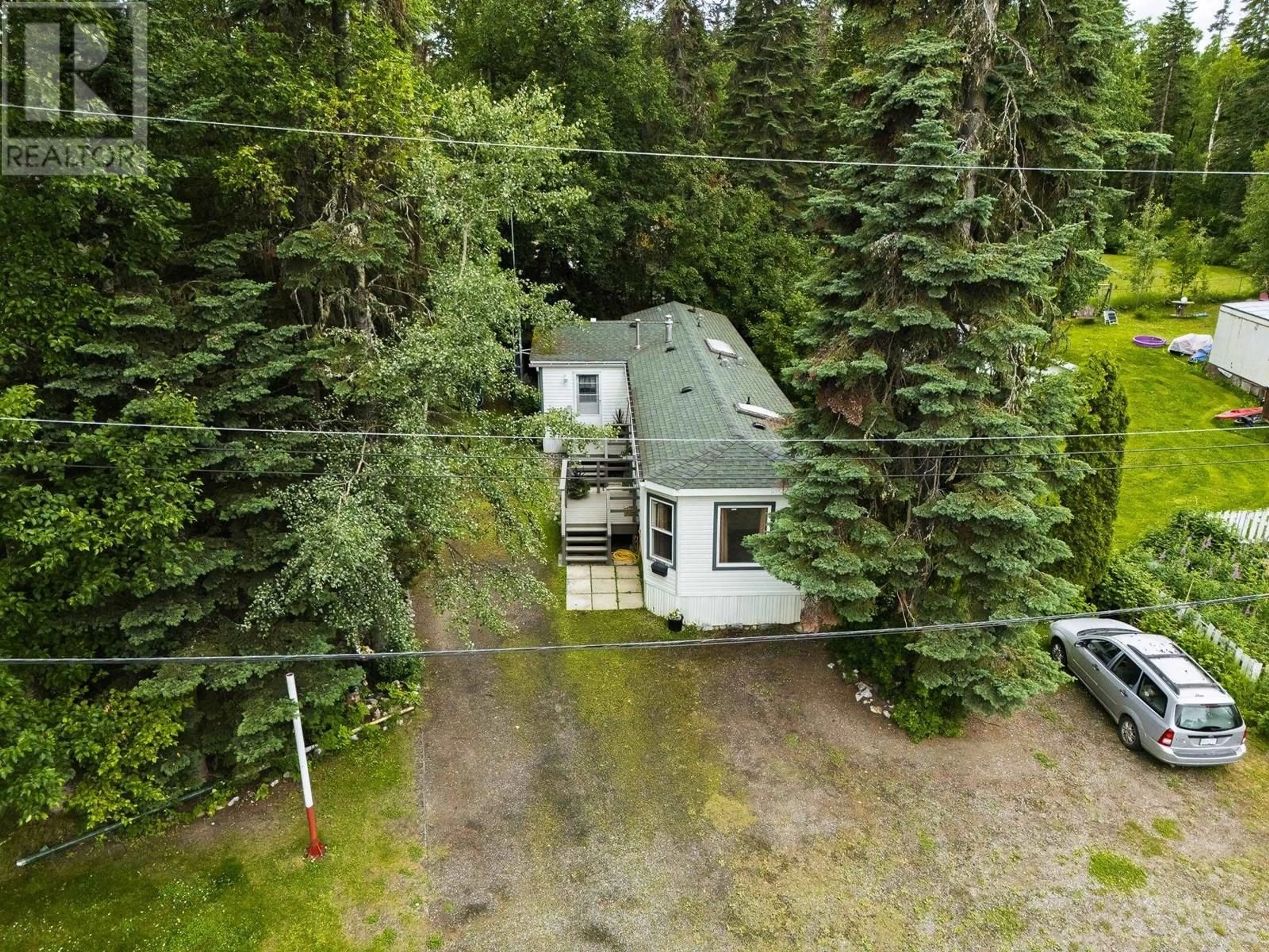 A pic from outside/outdoor area/front of a property/back of a property/a pic from drone, forest/trees view for 3802 BALSUM ROAD, Prince George British Columbia V2K1Z8