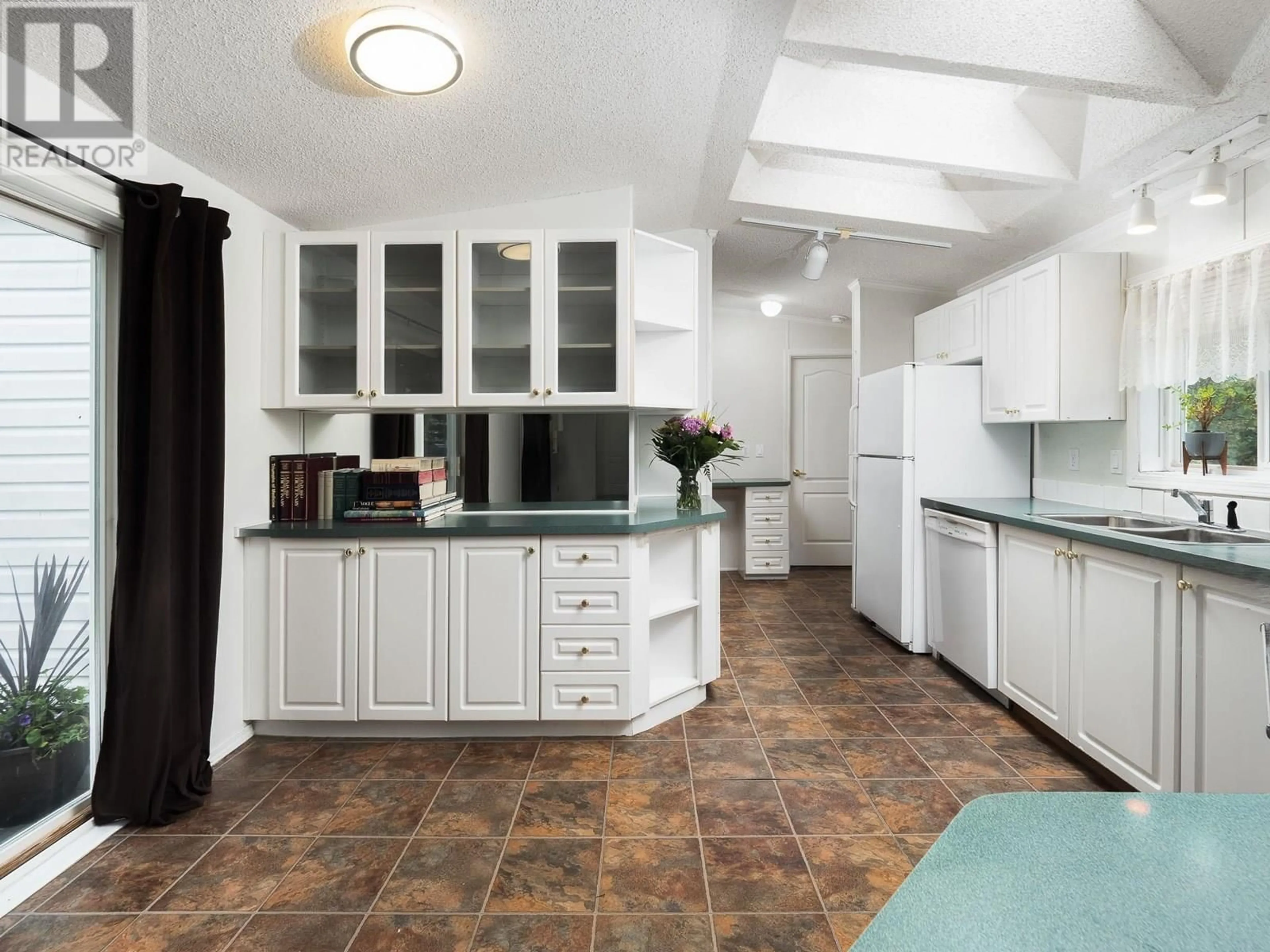 Standard kitchen, ceramic/tile floor for 3802 BALSUM ROAD, Prince George British Columbia V2K1Z8