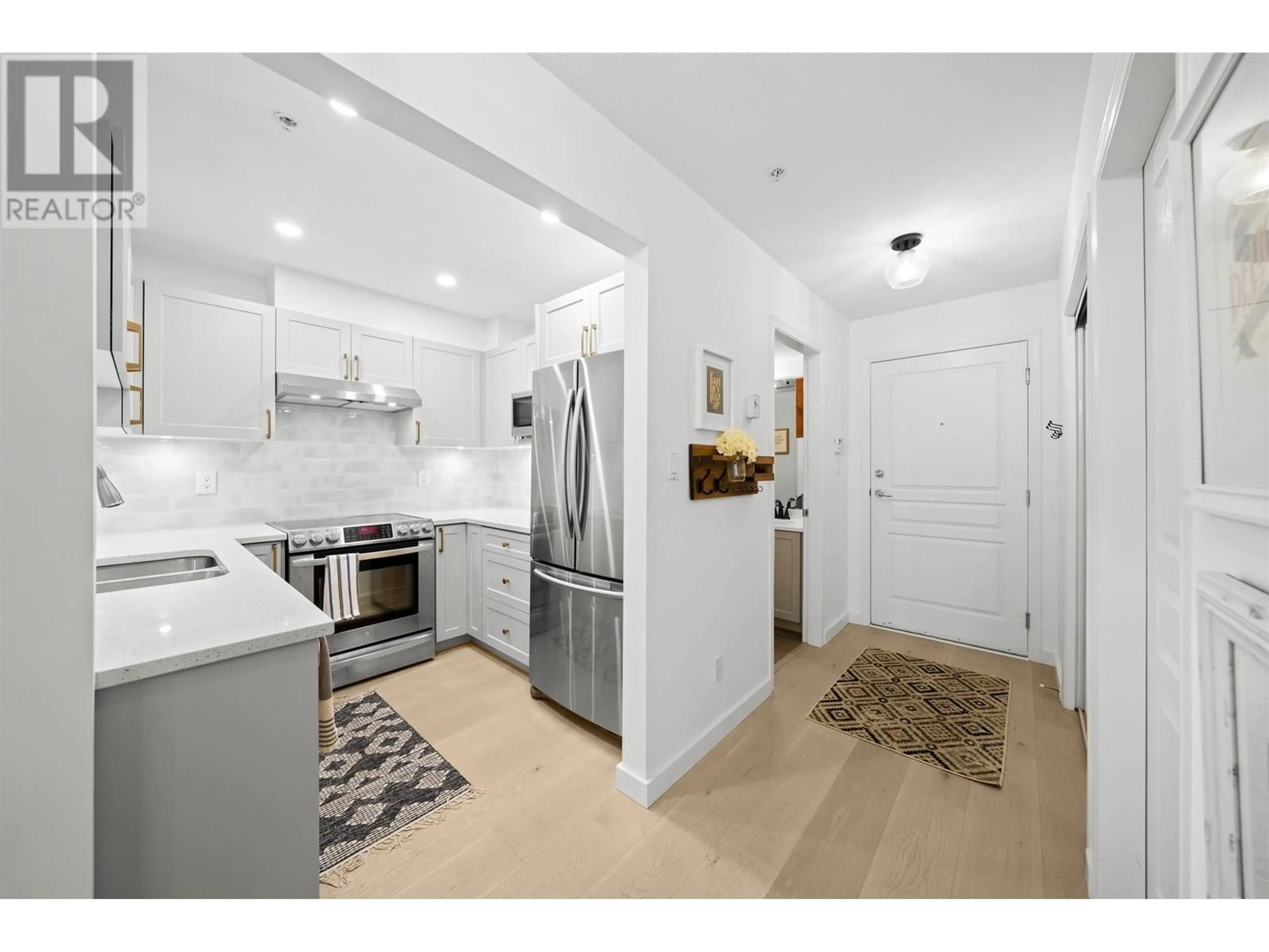 Open concept kitchen, unknown for 202 - 3333 4TH AVENUE, Vancouver British Columbia V6R4R9
