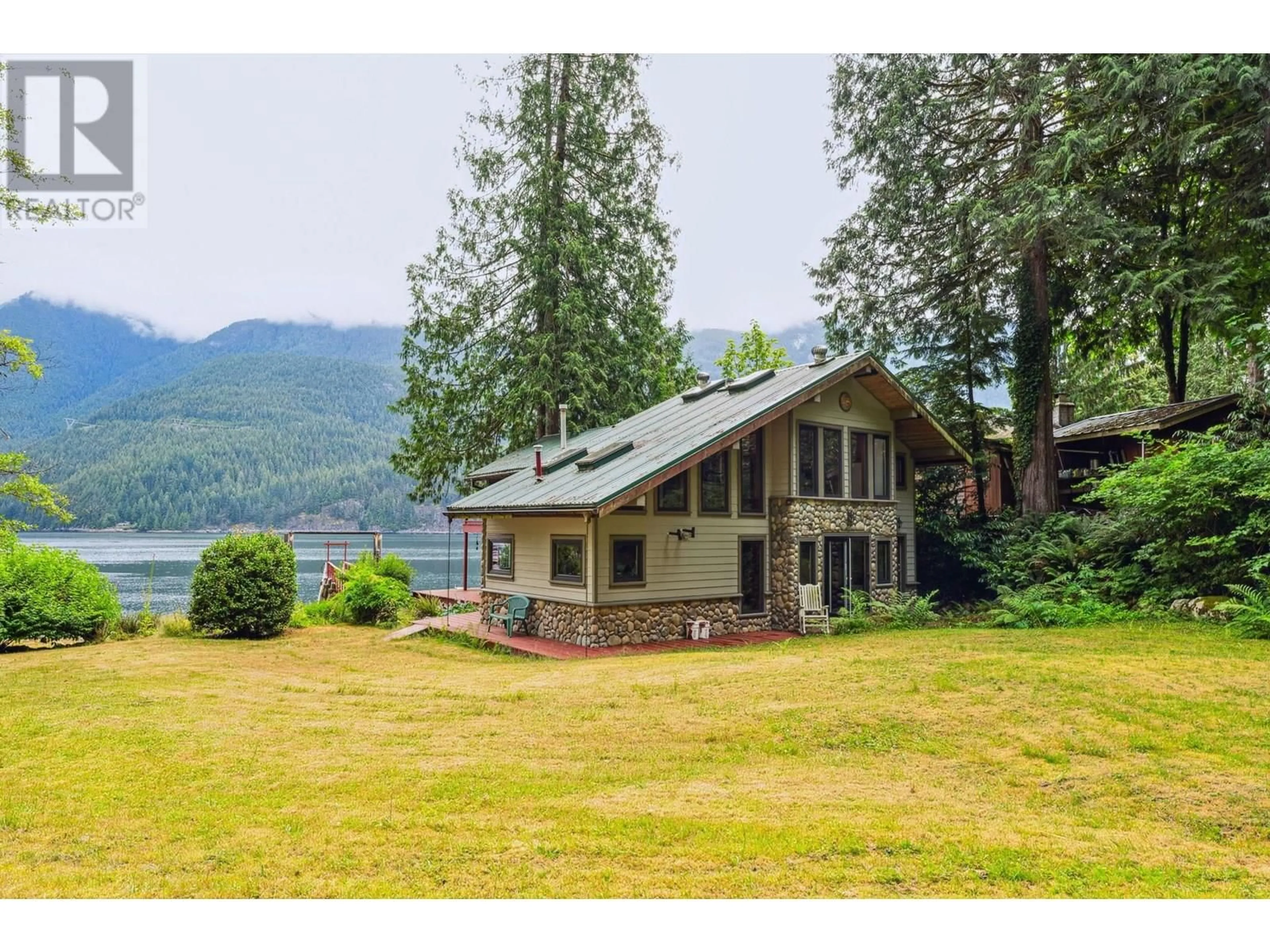 A pic from outside/outdoor area/front of a property/back of a property/a pic from drone, mountain view for 12&13 COLDWELL BEACH, North Vancouver British Columbia V0V0V0