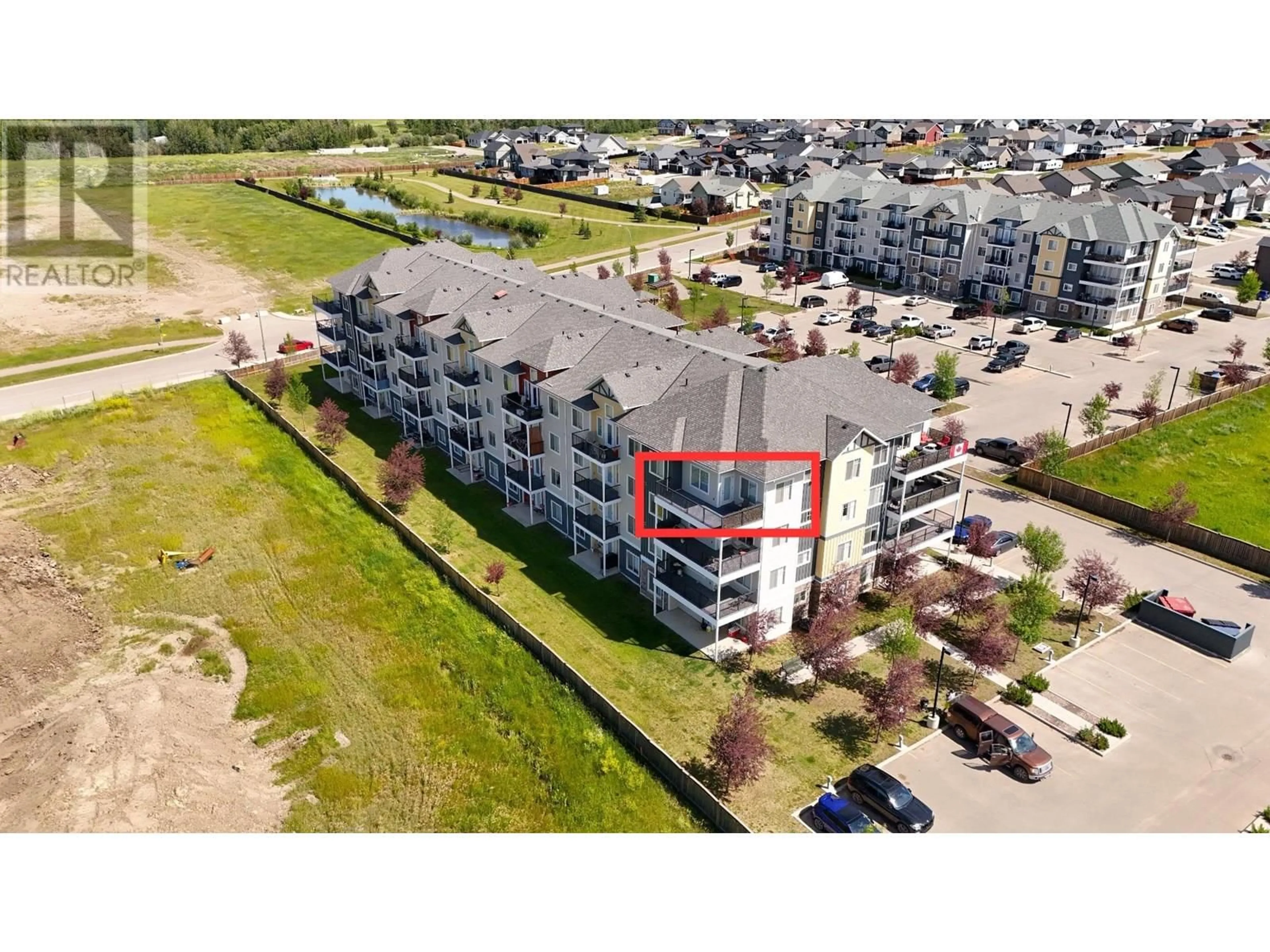 A pic from outside/outdoor area/front of a property/back of a property/a pic from drone, building for 404 - 11205 105 AVENUE, Fort St. John British Columbia V1J0L3