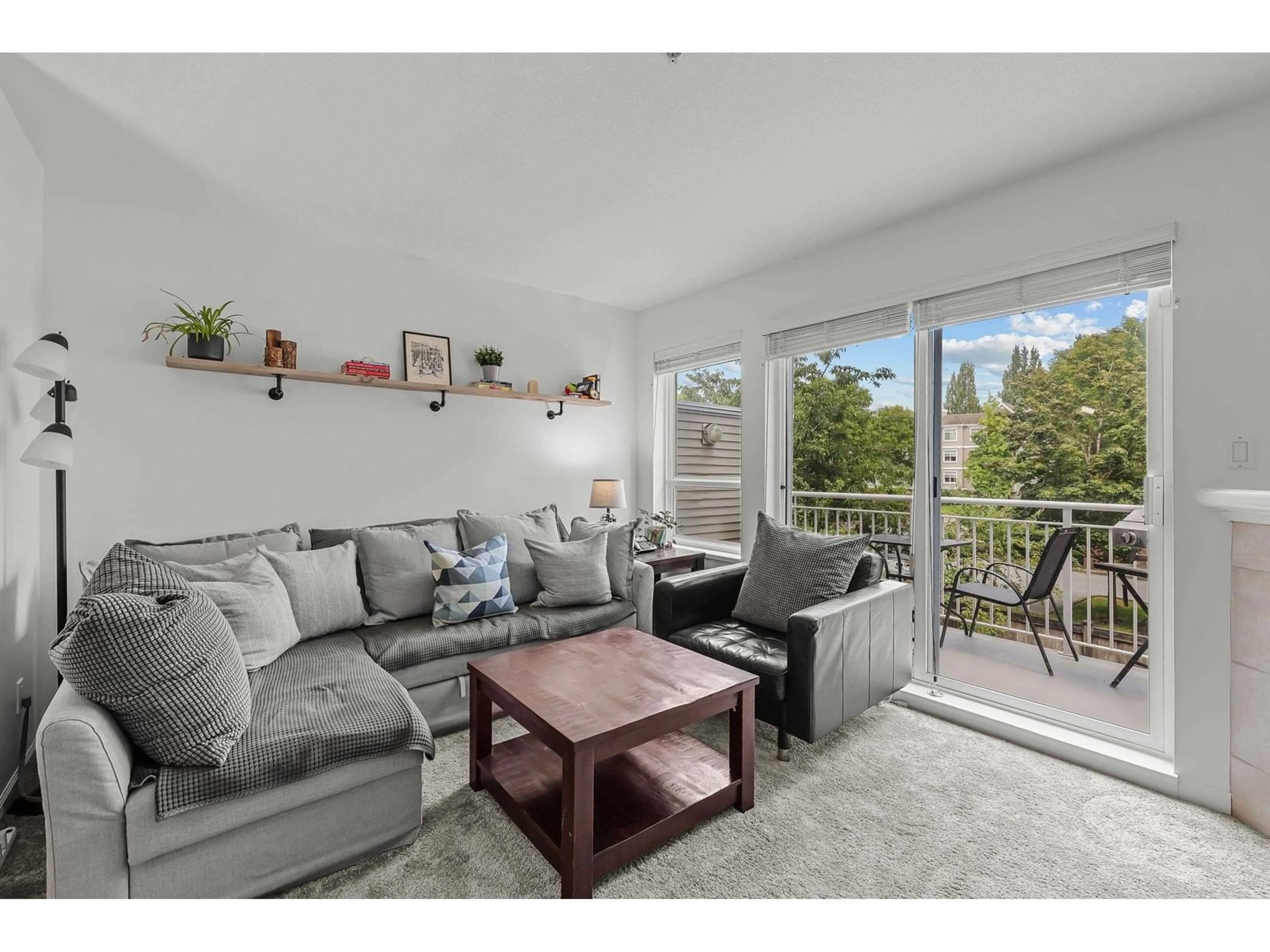 Living room with furniture, wood/laminate floor for 14 - 20890 57, Langley British Columbia V3A8M7