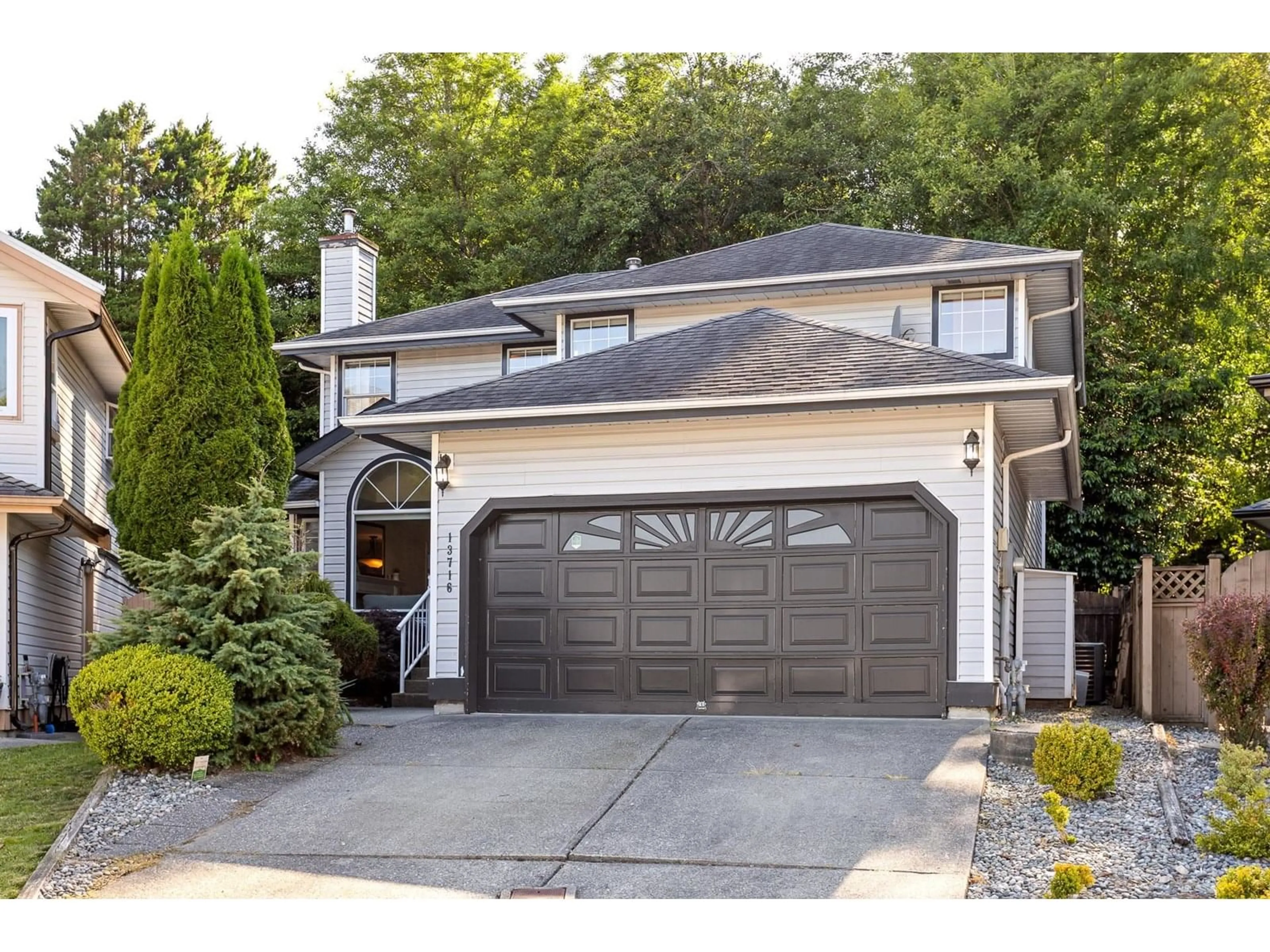 Home with vinyl exterior material, street for 13716 63B, Surrey British Columbia V3X3J7