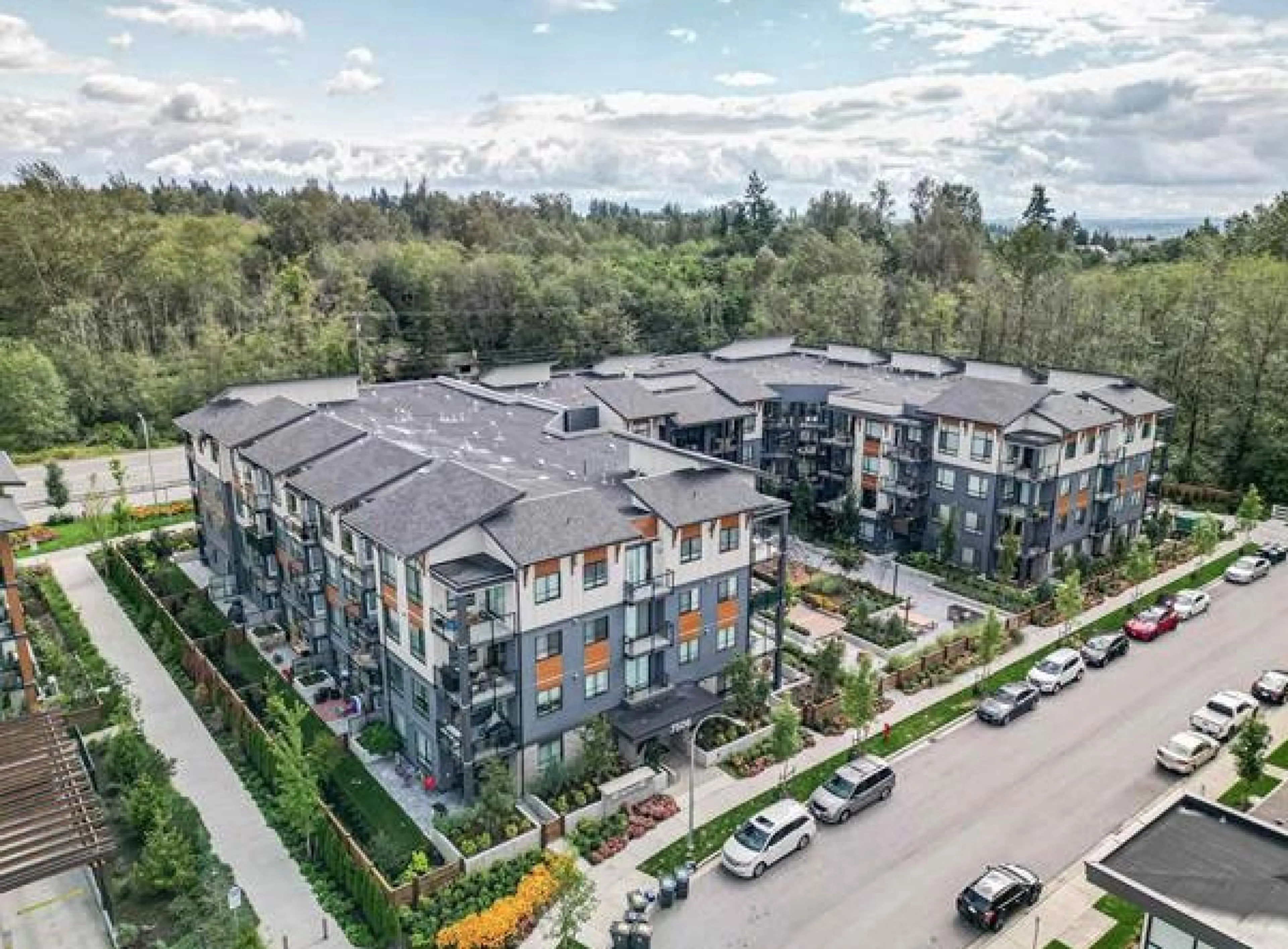 A pic from outside/outdoor area/front of a property/back of a property/a pic from drone, unknown for 104 - 7506 199A, Langley British Columbia V2Y3K9